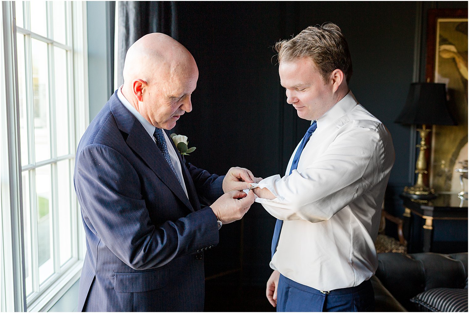 father helps groom with cufflinks on morning of NJ wedding 