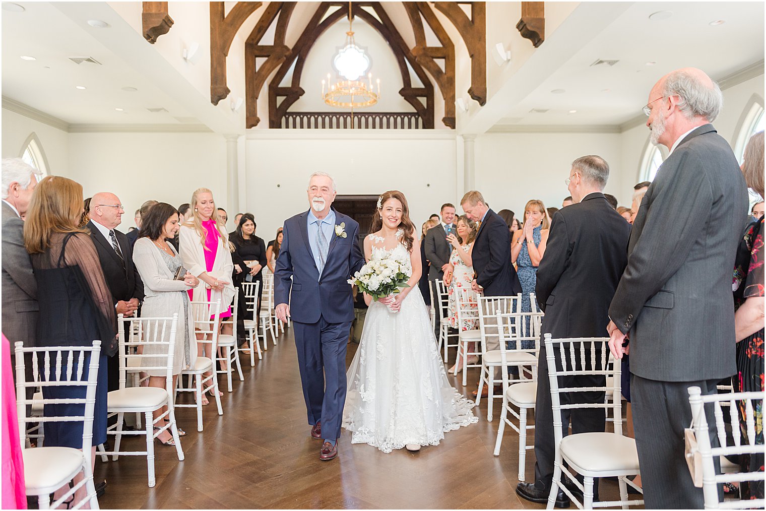 bride and father enter wedding ceremony in chapel at Park Chateau Estate