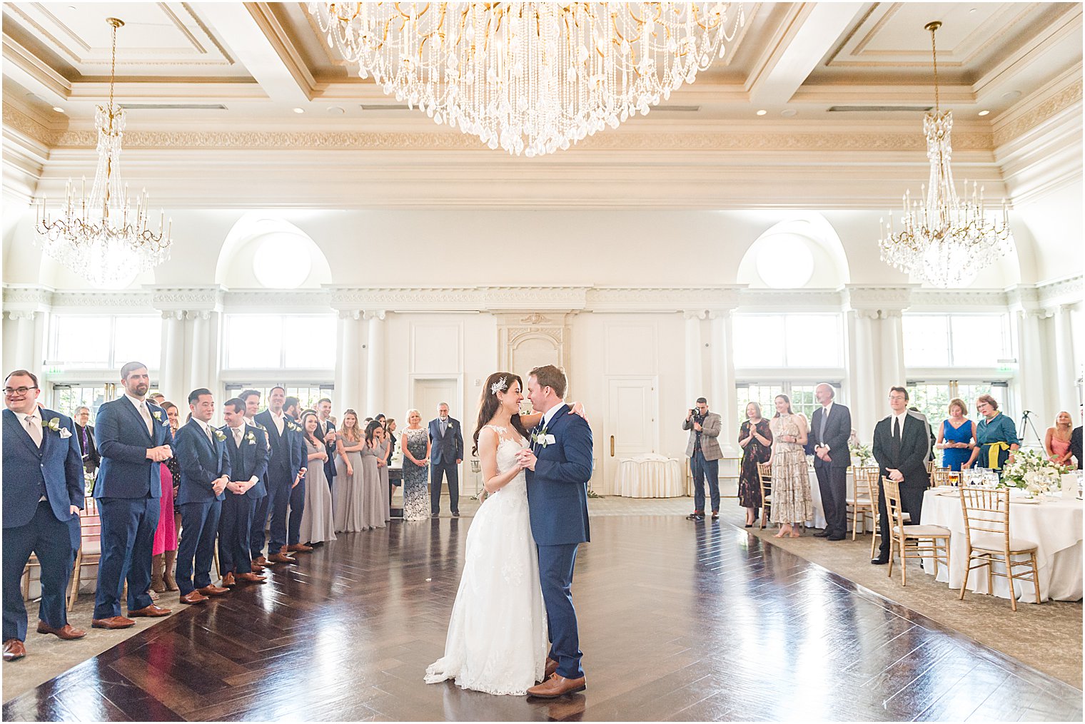 newlyweds dance in balloom at Park Chateau Estate
