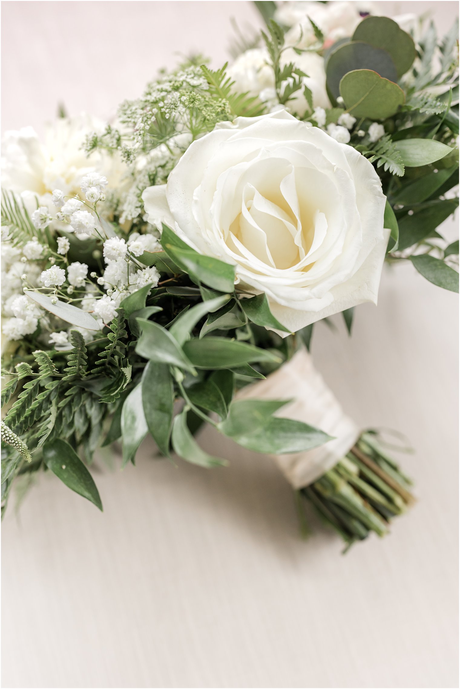 bouquet with white flowers and baby's breath for garden style wedding at The English Manor