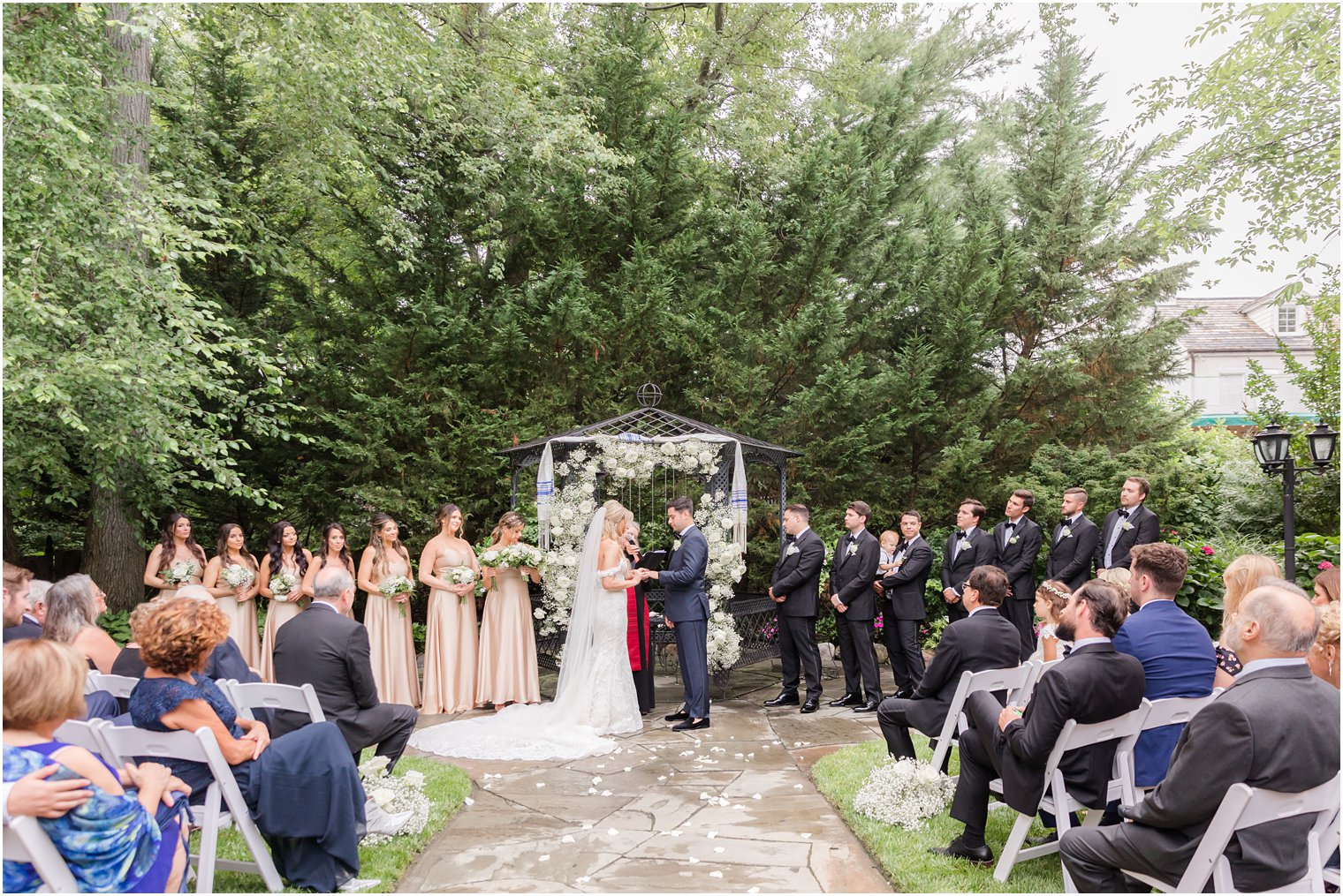 garden style wedding ceremony at The English Manor in gardens 