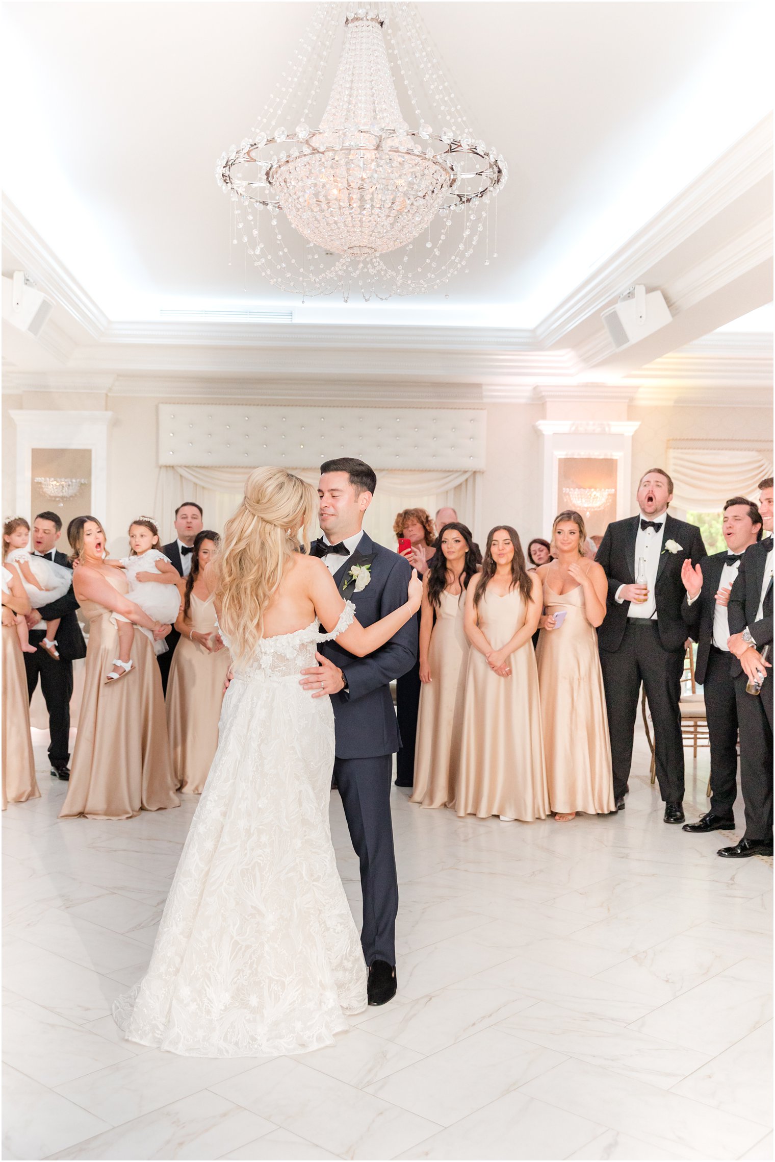 bride and groom dance during ballroom wedding reception in Ocean NJ