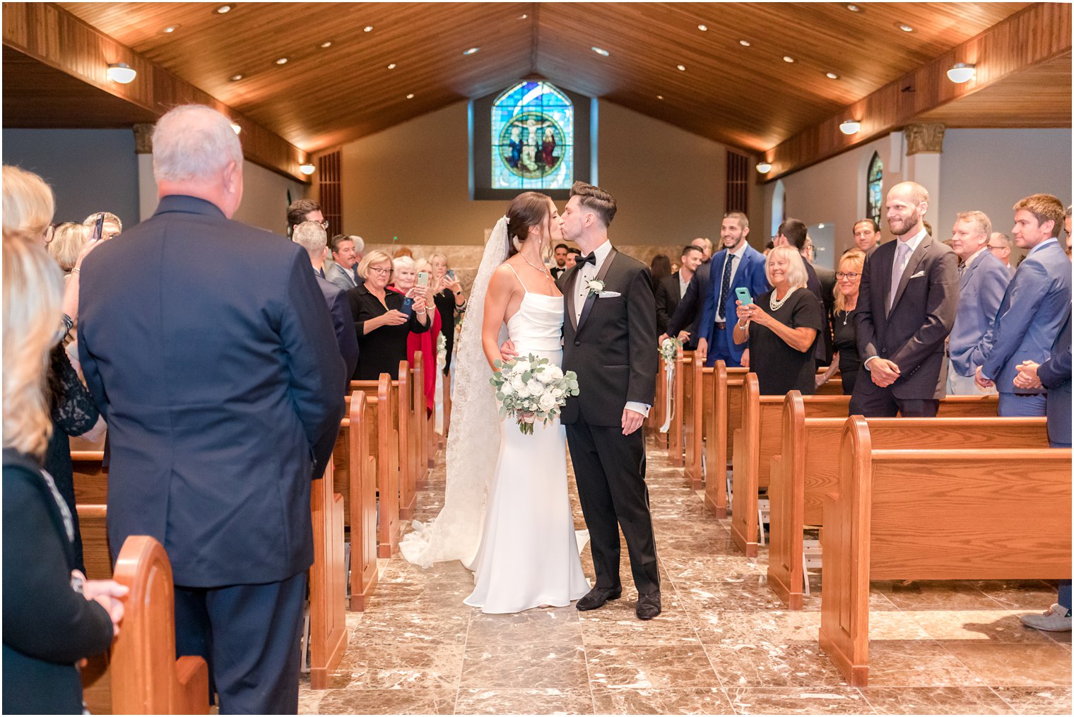newlyweds leave traditional church ceremony in small New Jersey church