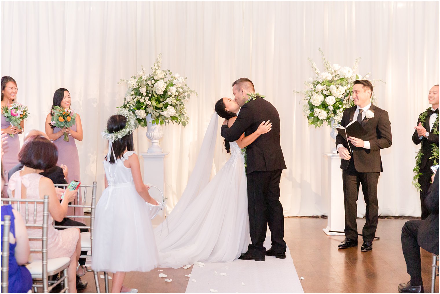 bride and groom kiss after ceremony at the Ballroom at the Ben