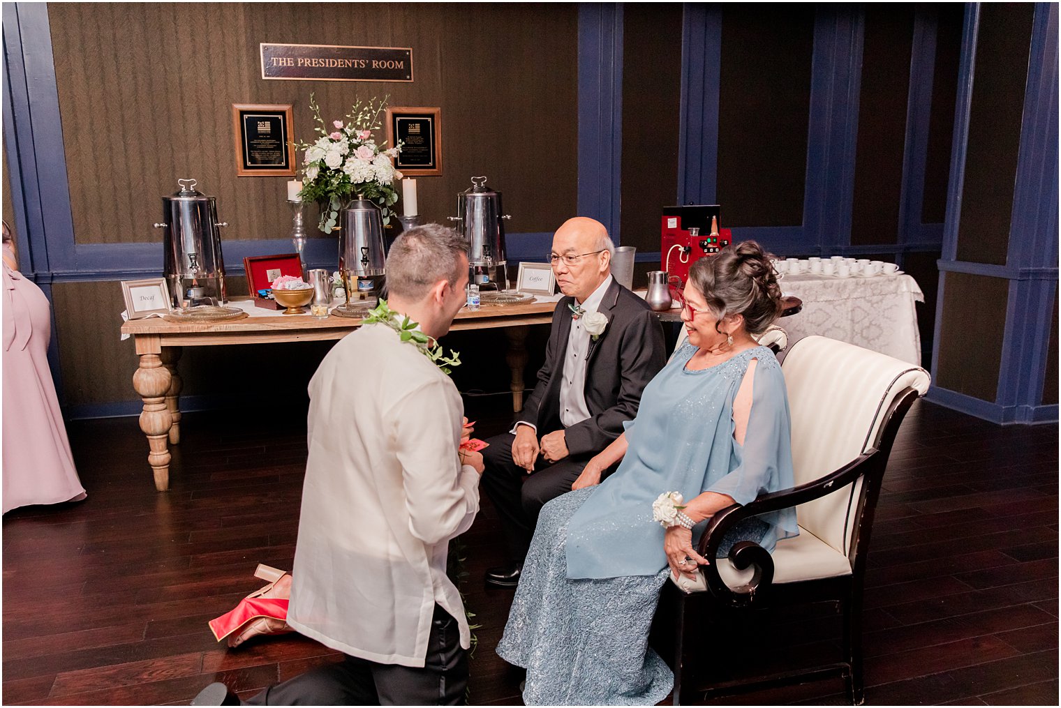 bride and groom serve parents tea during ceremony at the Ballroom at the Ben
