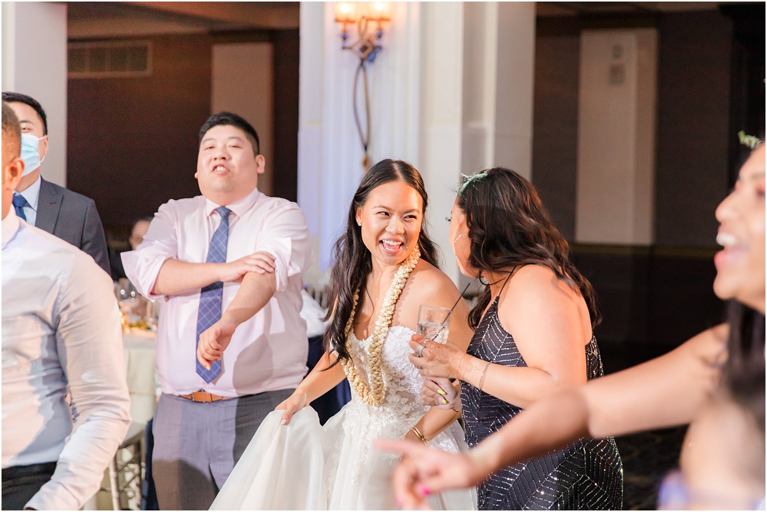 bride dances with guests during Philly PA wedding reception 