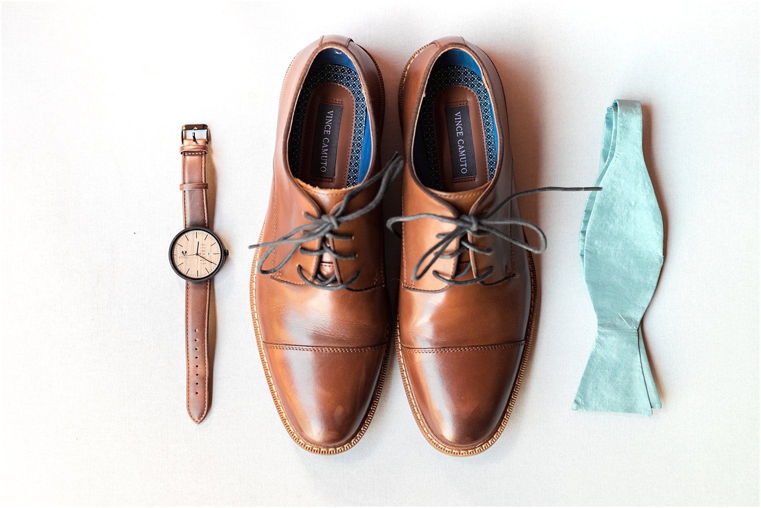 groom's brown shoes and sea glass colored tie 