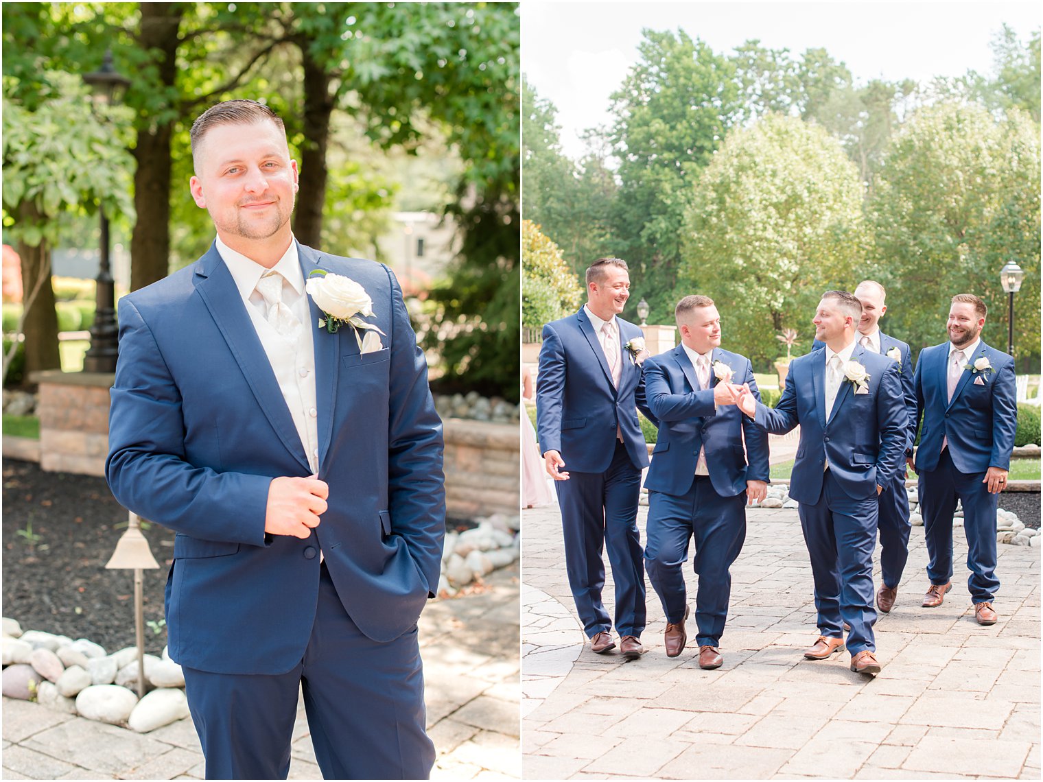 groom stands with groomsmen in navy suits 