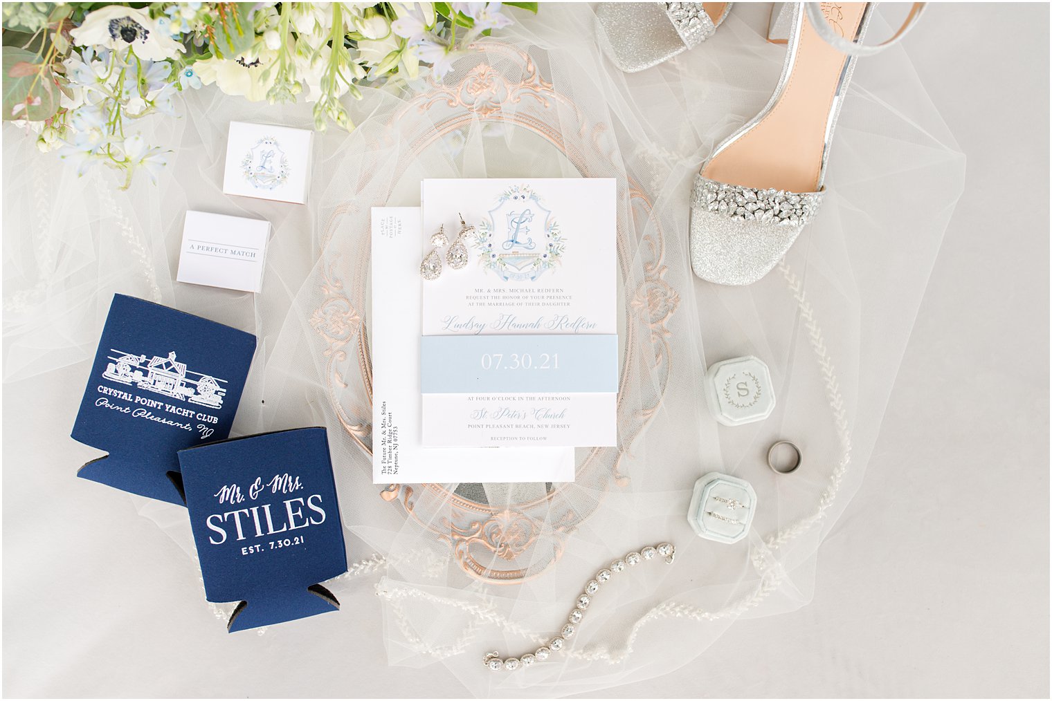 stationery set and details for coastal inspired wedding at Crystal Point Yacht Club
