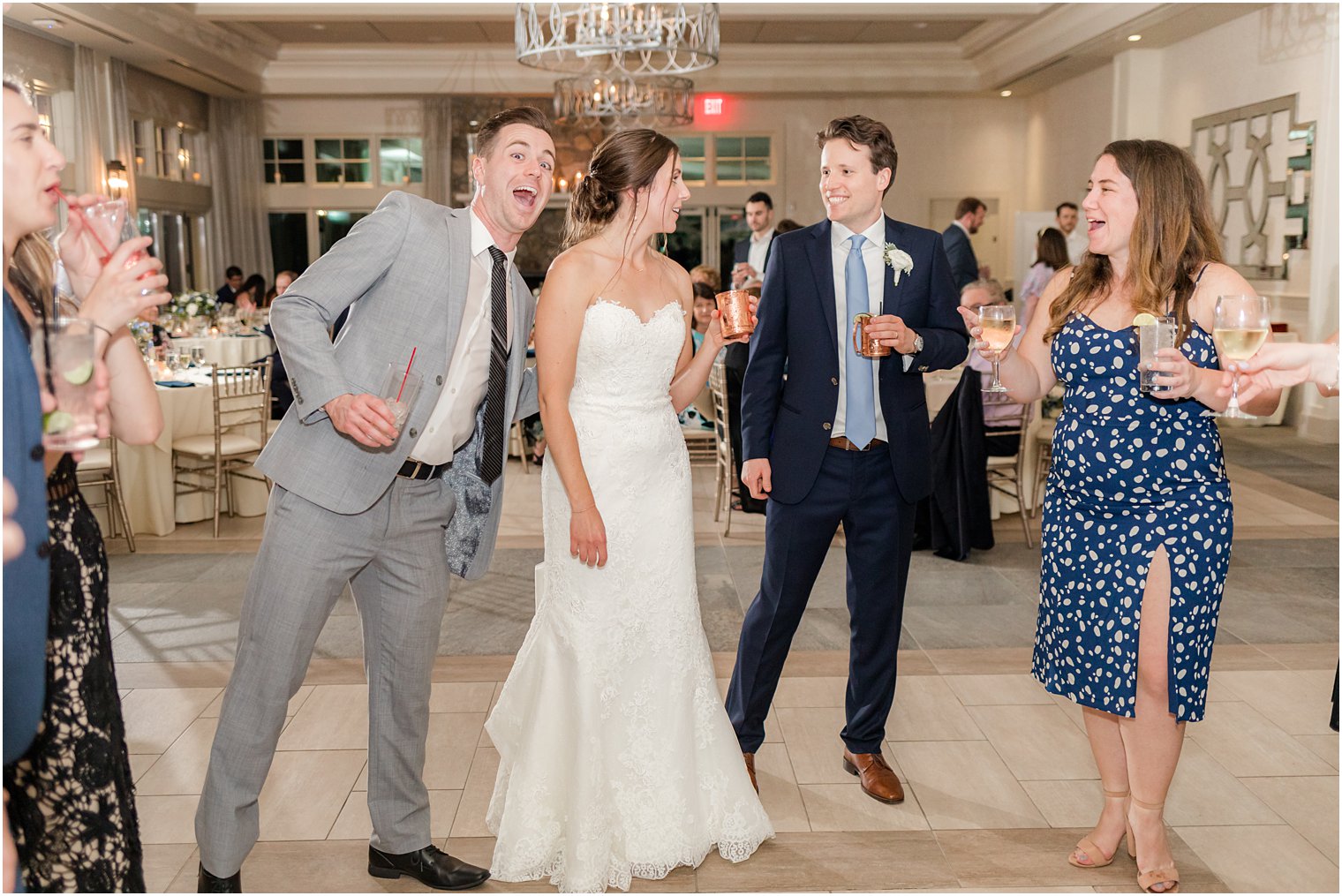 guests dance with bride and groom in NJ wedding reception