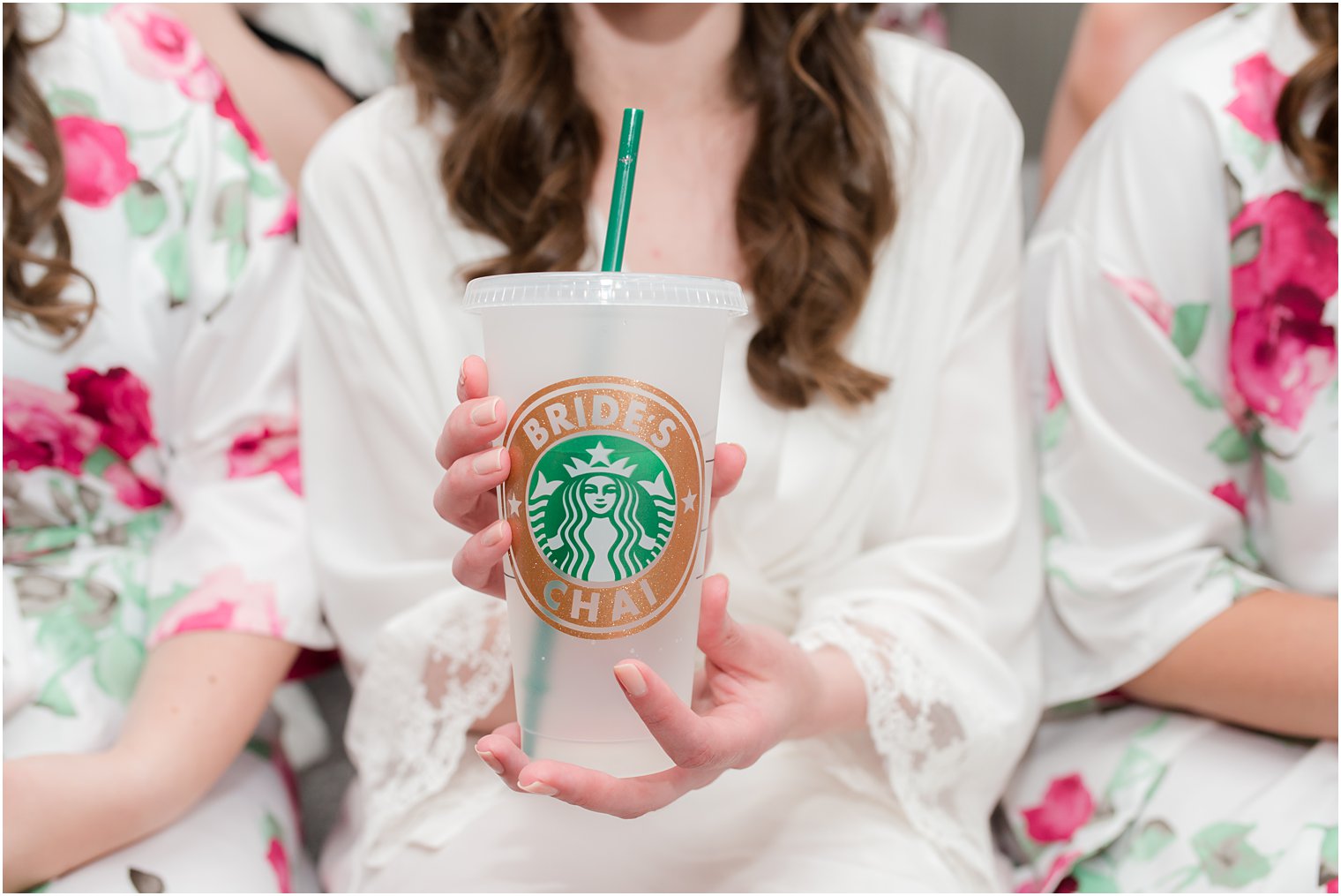 bride holds custom Starbucks cup 