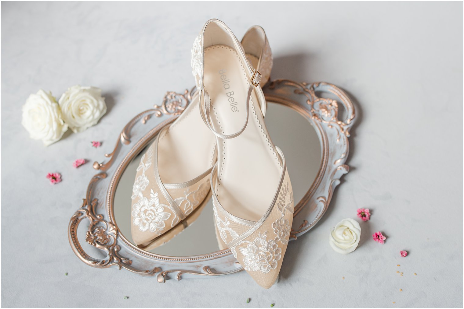 wedding shoes rest on mirrored tray at the English Manor