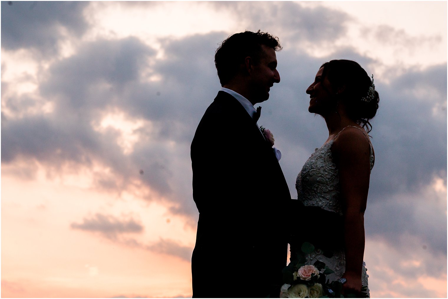 sunset portrait of bride and groom 