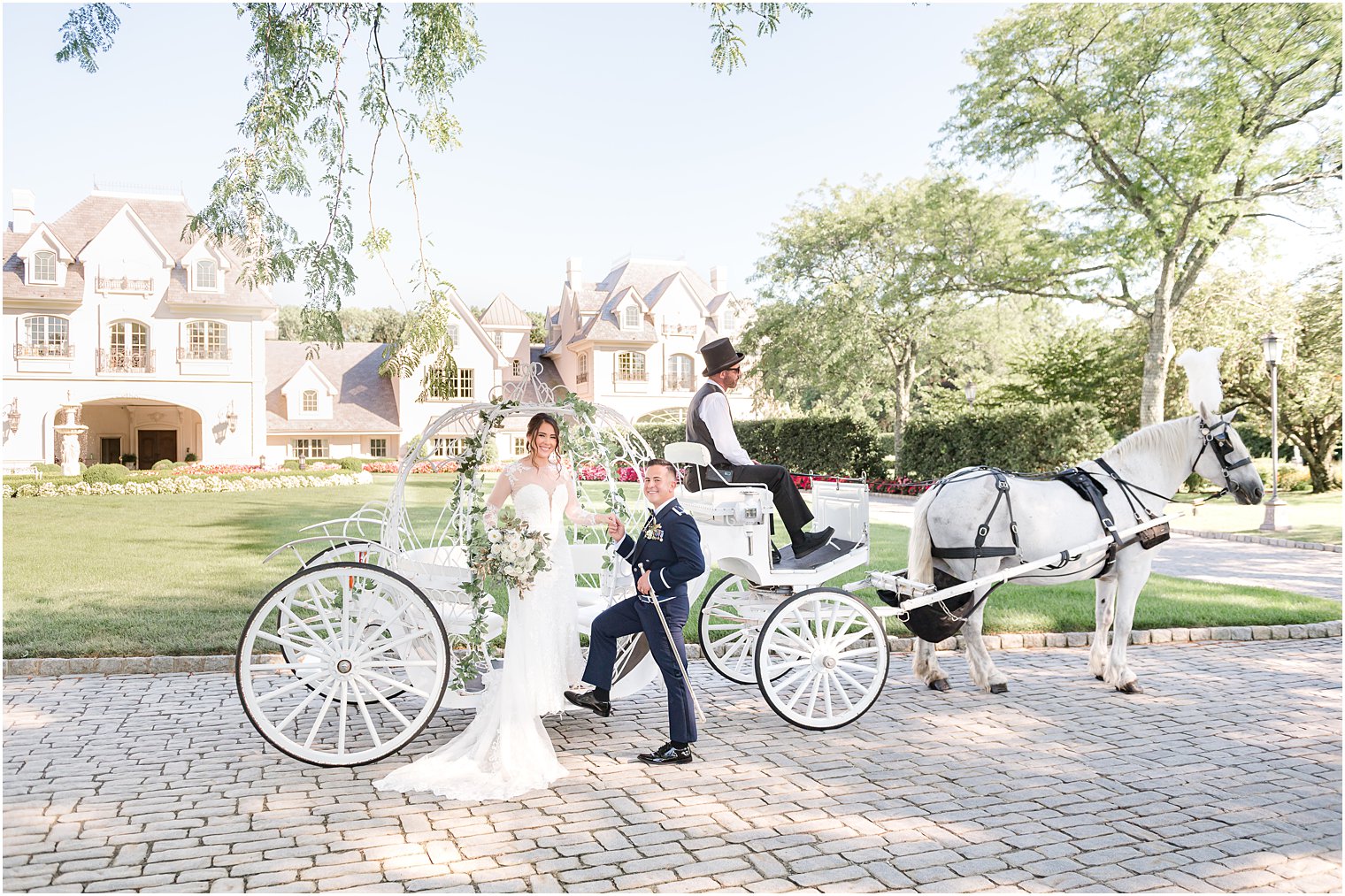 groom helps bride down from carriage at Park Chateau Estate