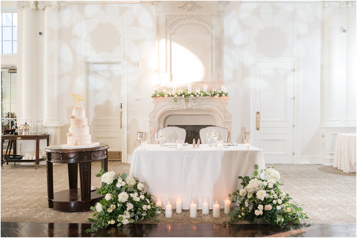 sweetheart table with white flowers 