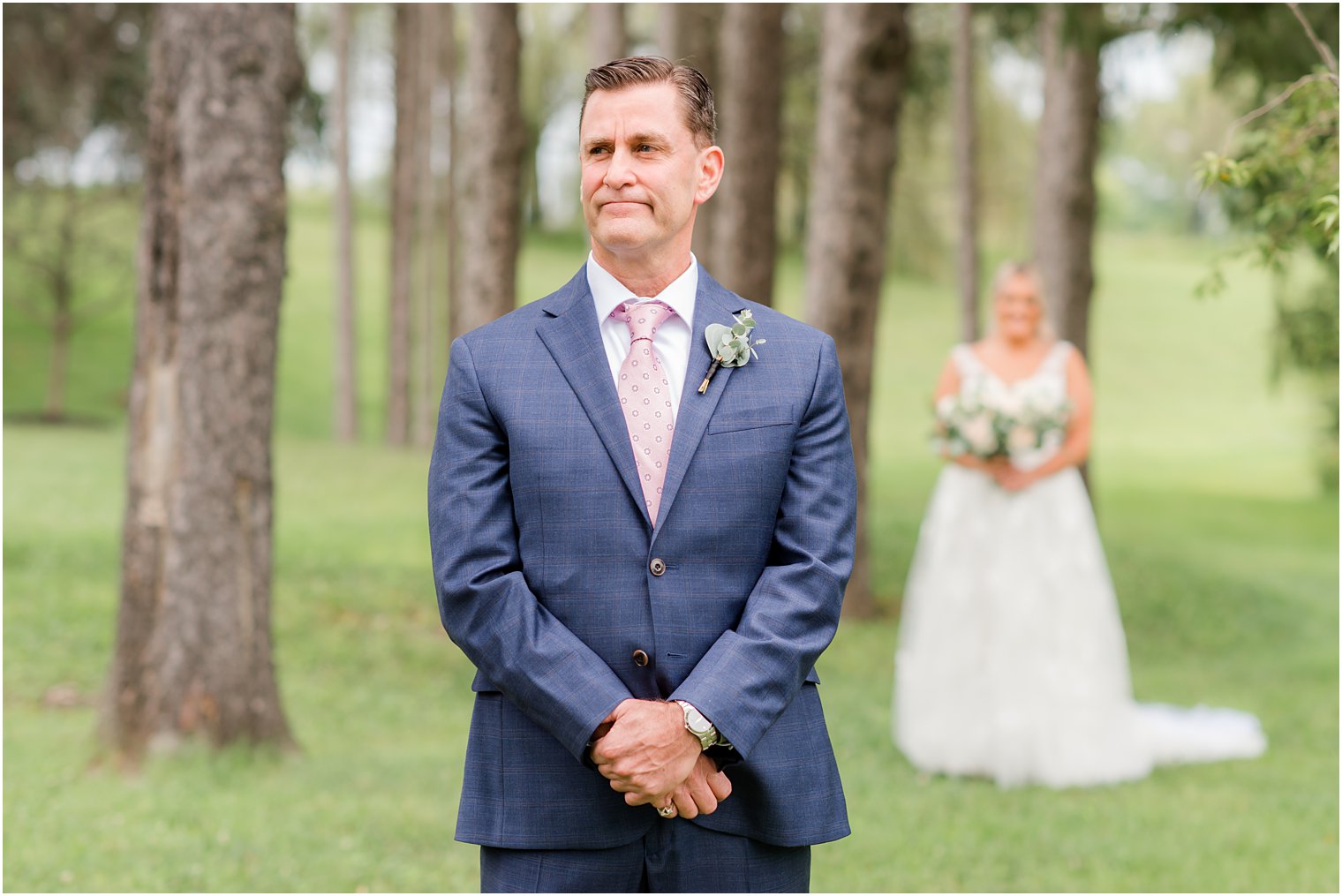 bride walks to meet dad for first look