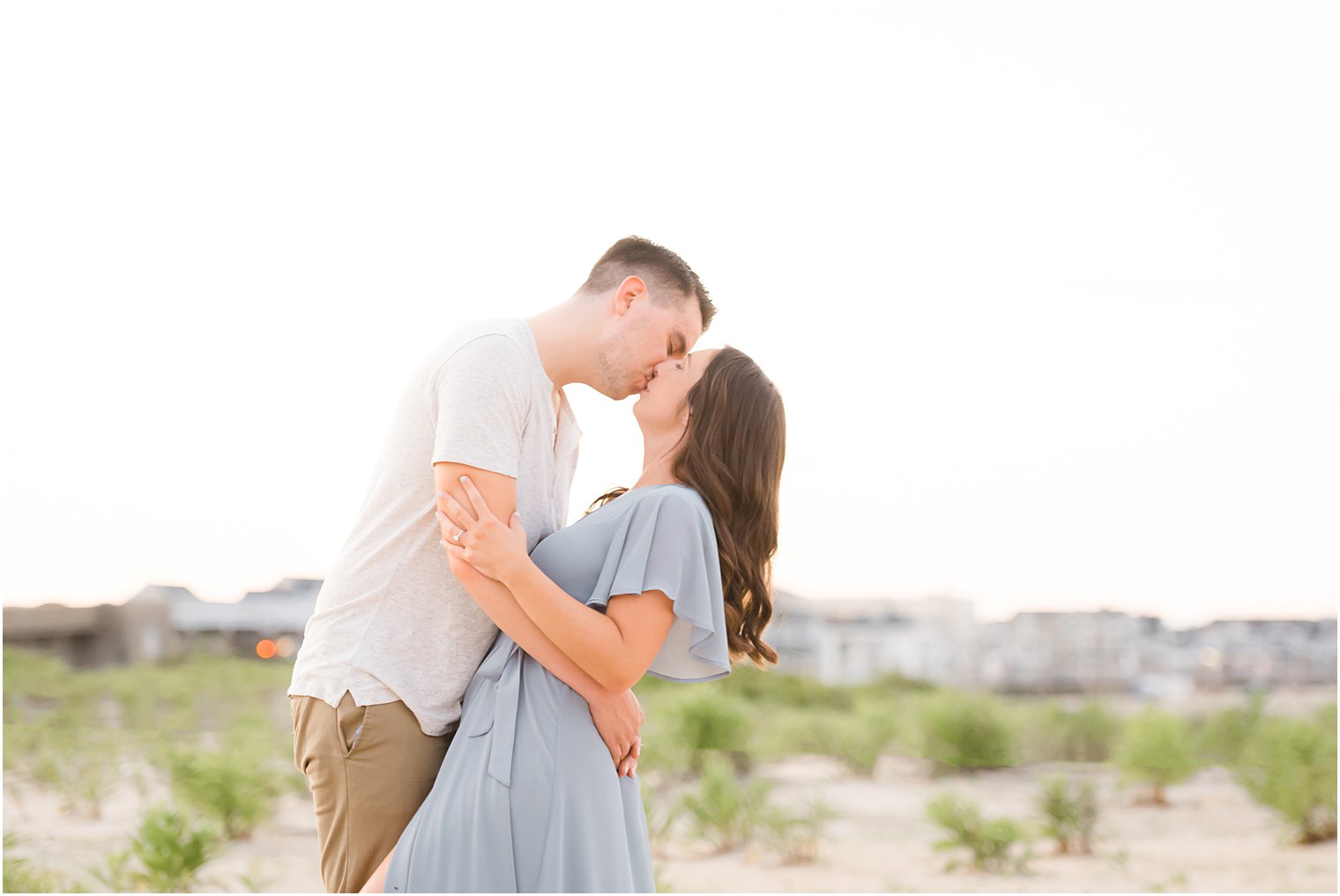 bride and groom kiss on Jersey Shore