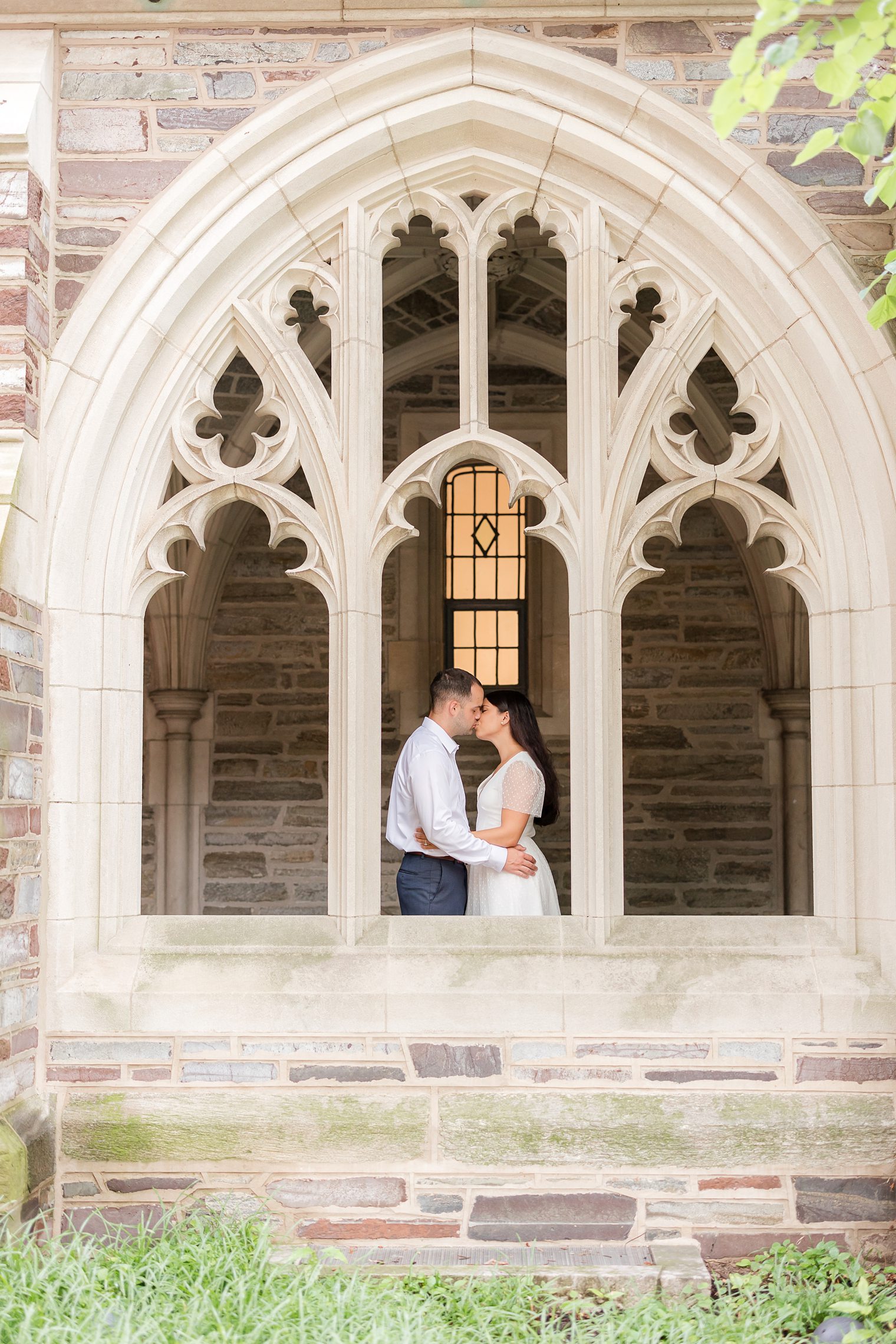 Happy couple kissing at their engagement session at Princeton New Jersey 