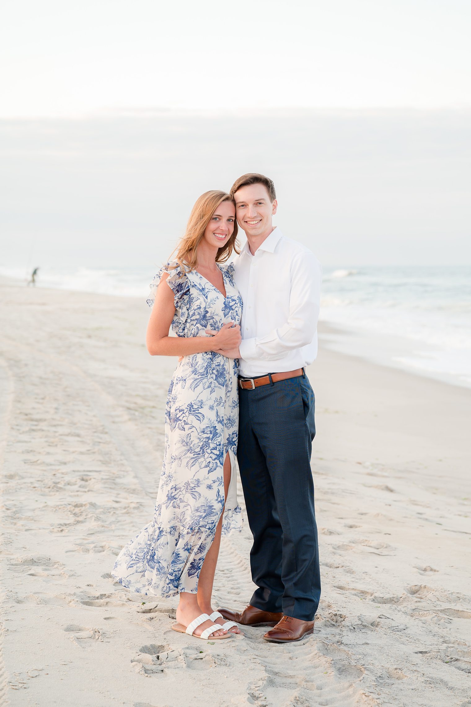 happily engaged couple enjoying their engagement session at Lavalette NJ