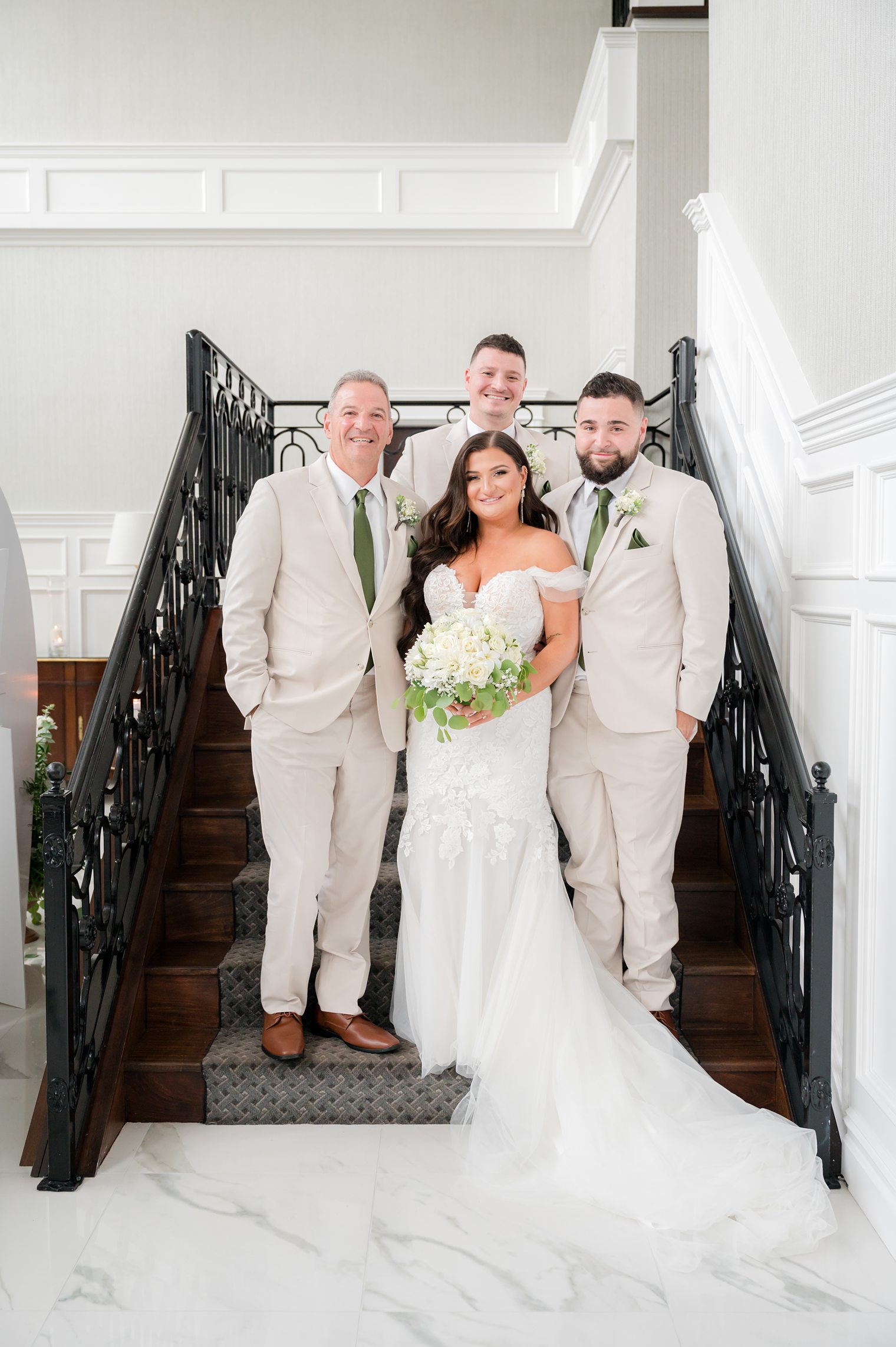 bride with her father and brother at The Mill Lakeside Manor 
