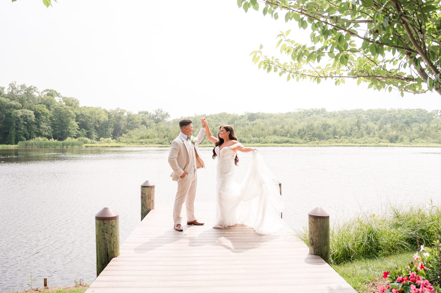 Happy couple holding heands after their first look at The Mill Lakeside Manor 