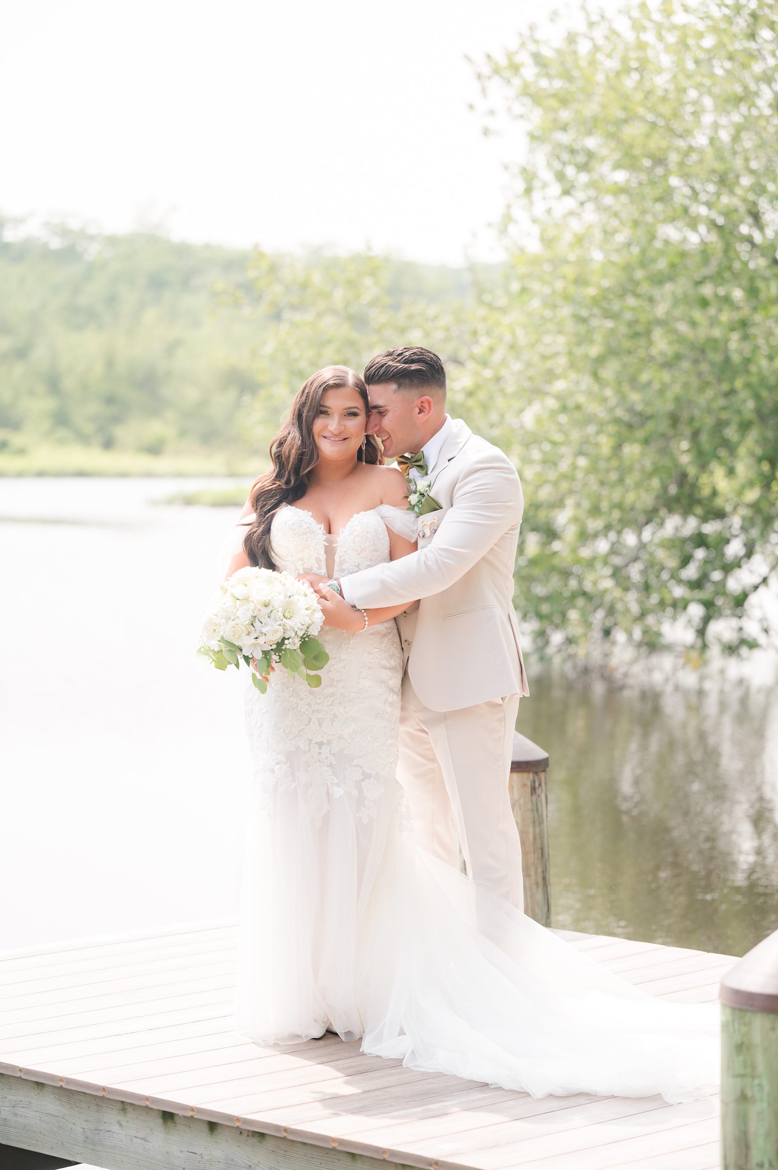 Future Husband and Wife hugging after their first look at The Mill Lakeside Manor 