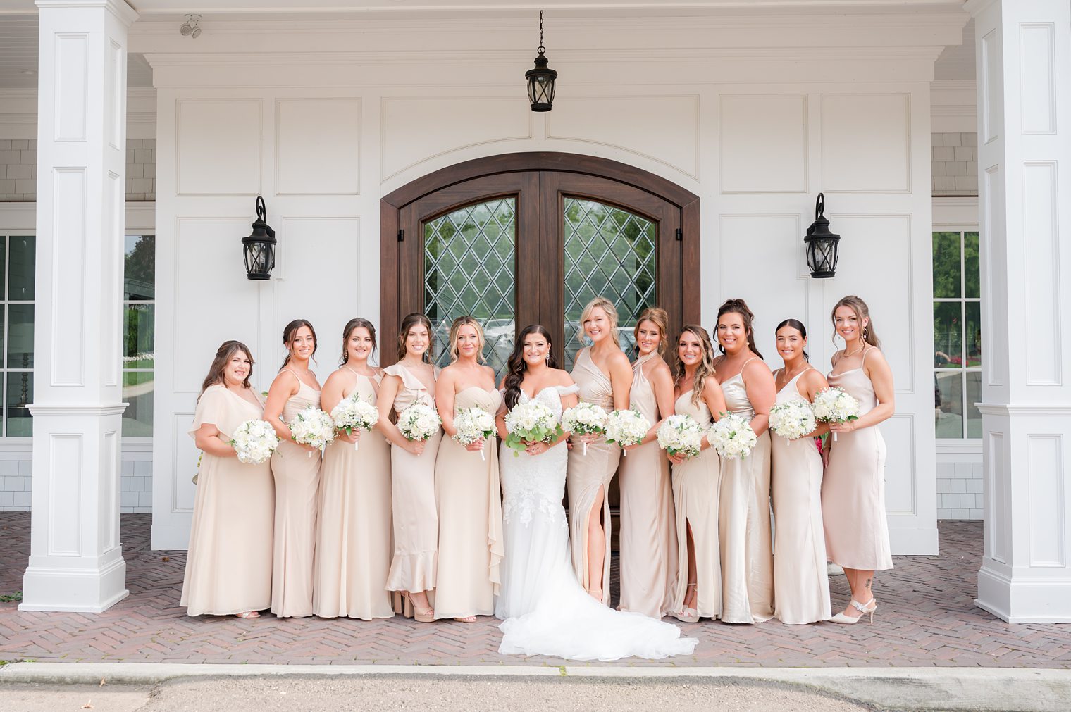 bride with her bridesmaids at The Mill Lakeside Manor