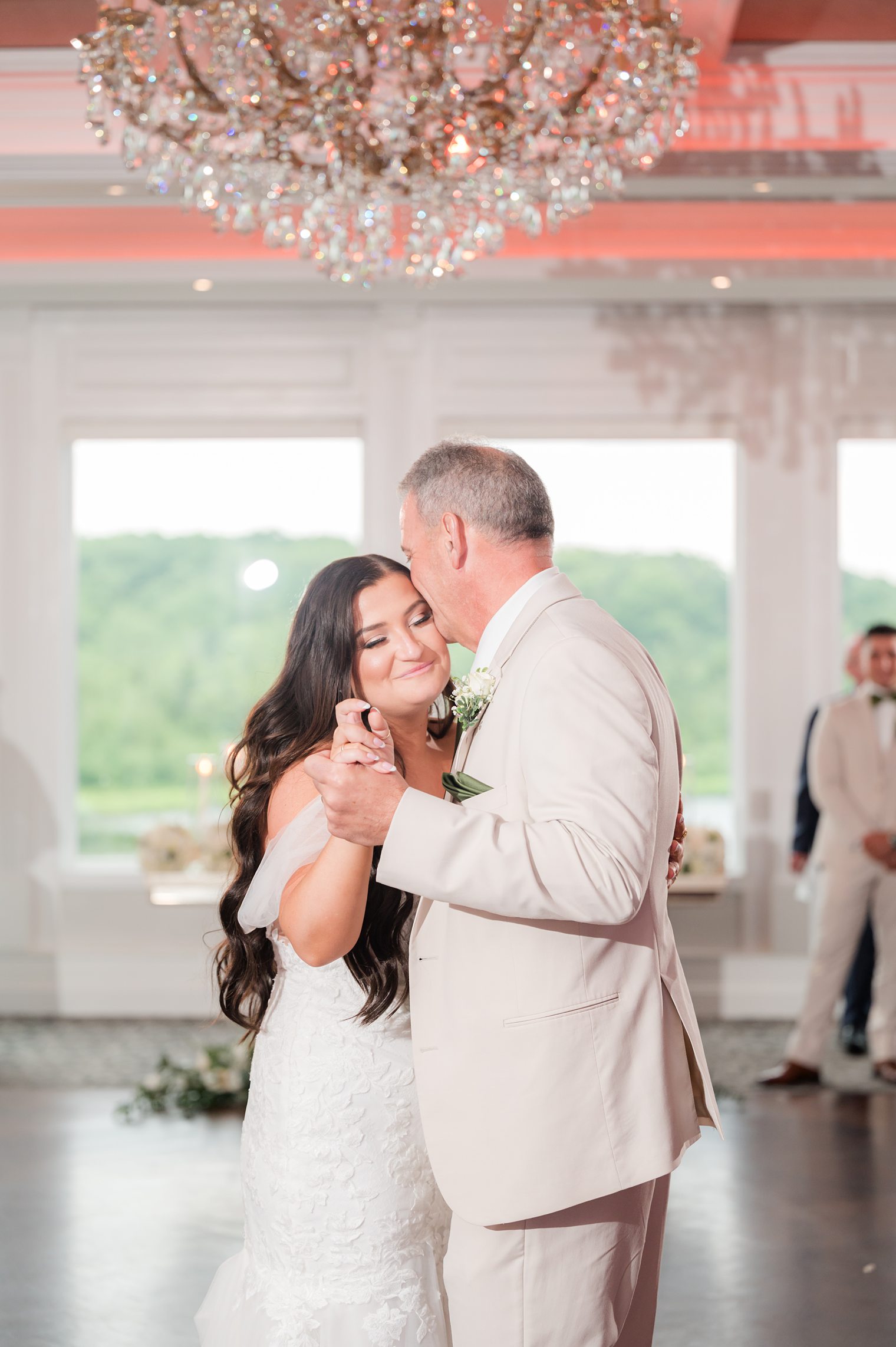 bride dancing with her father for the first time as wife 