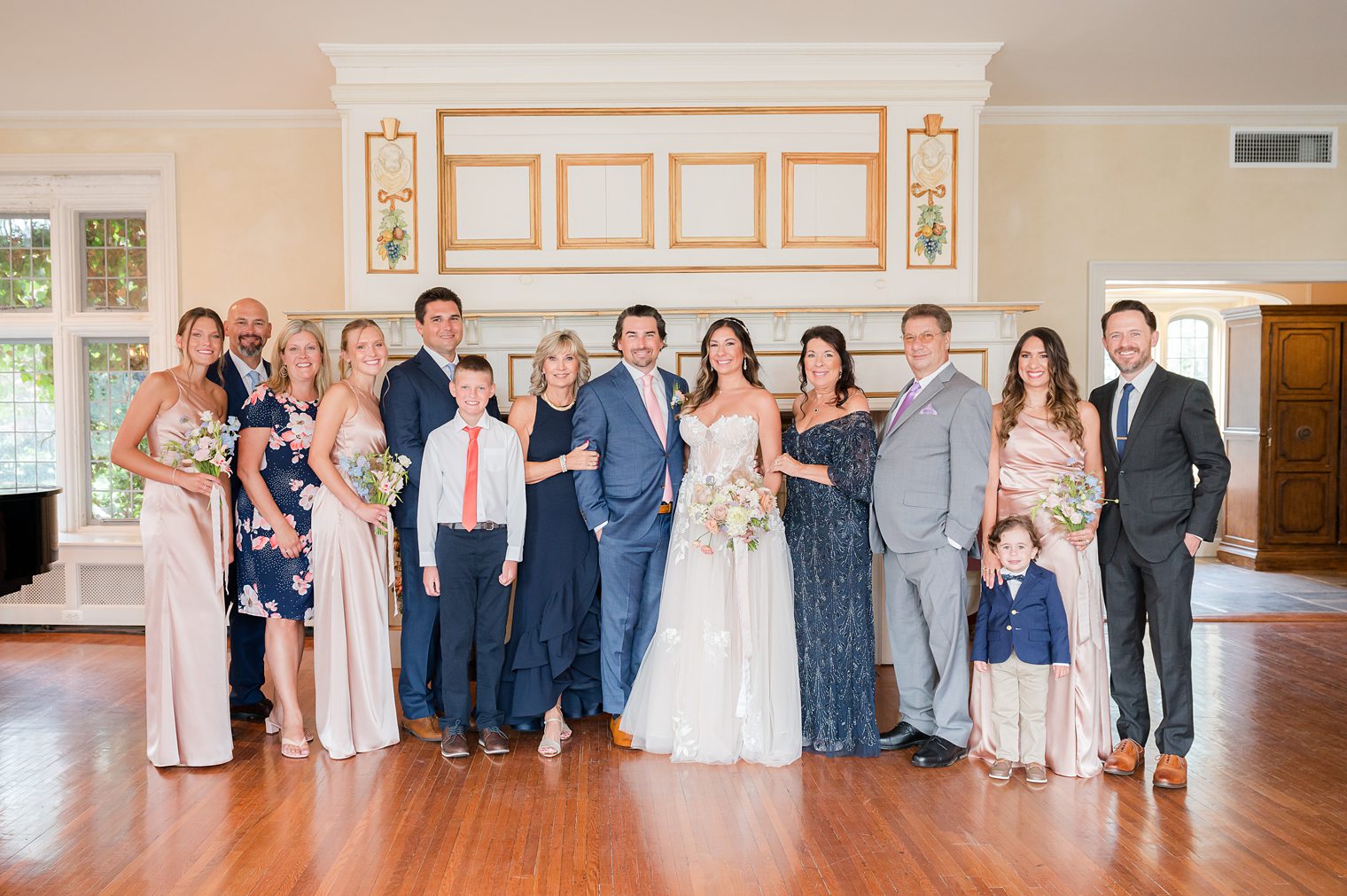 Family of the bride and groom together at Riverhouse at Rumson Country Club