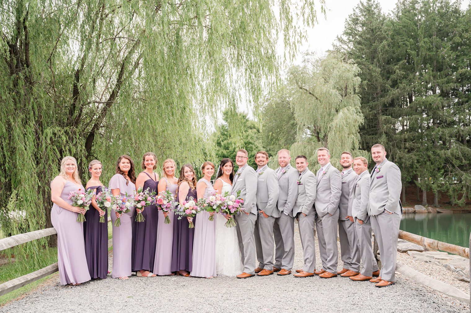 couple with their bridesmaids and best men at Windows on the Water at Frogbridge