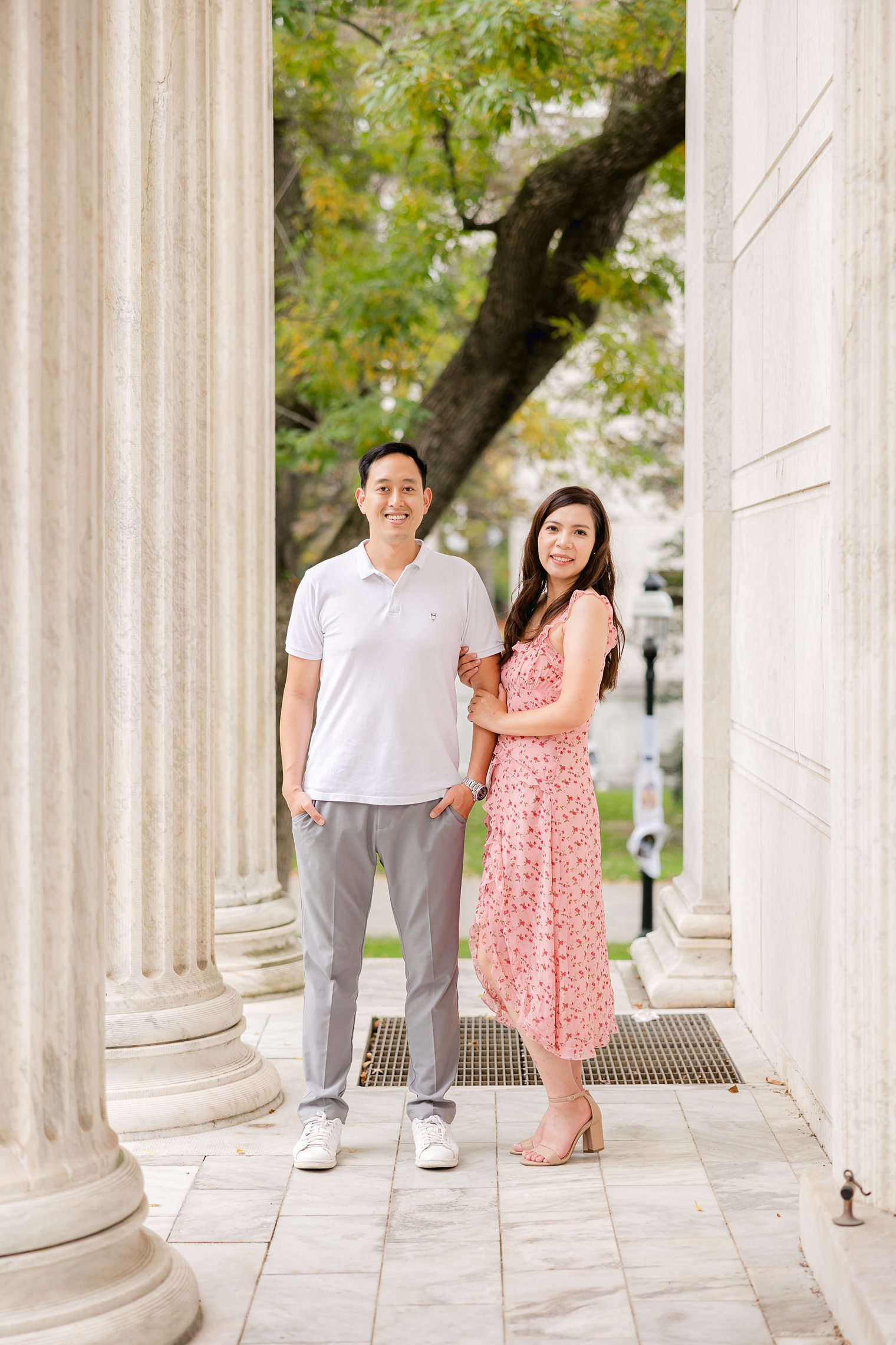 Future husband and wife posing during their engagement session at Princeton Campus University