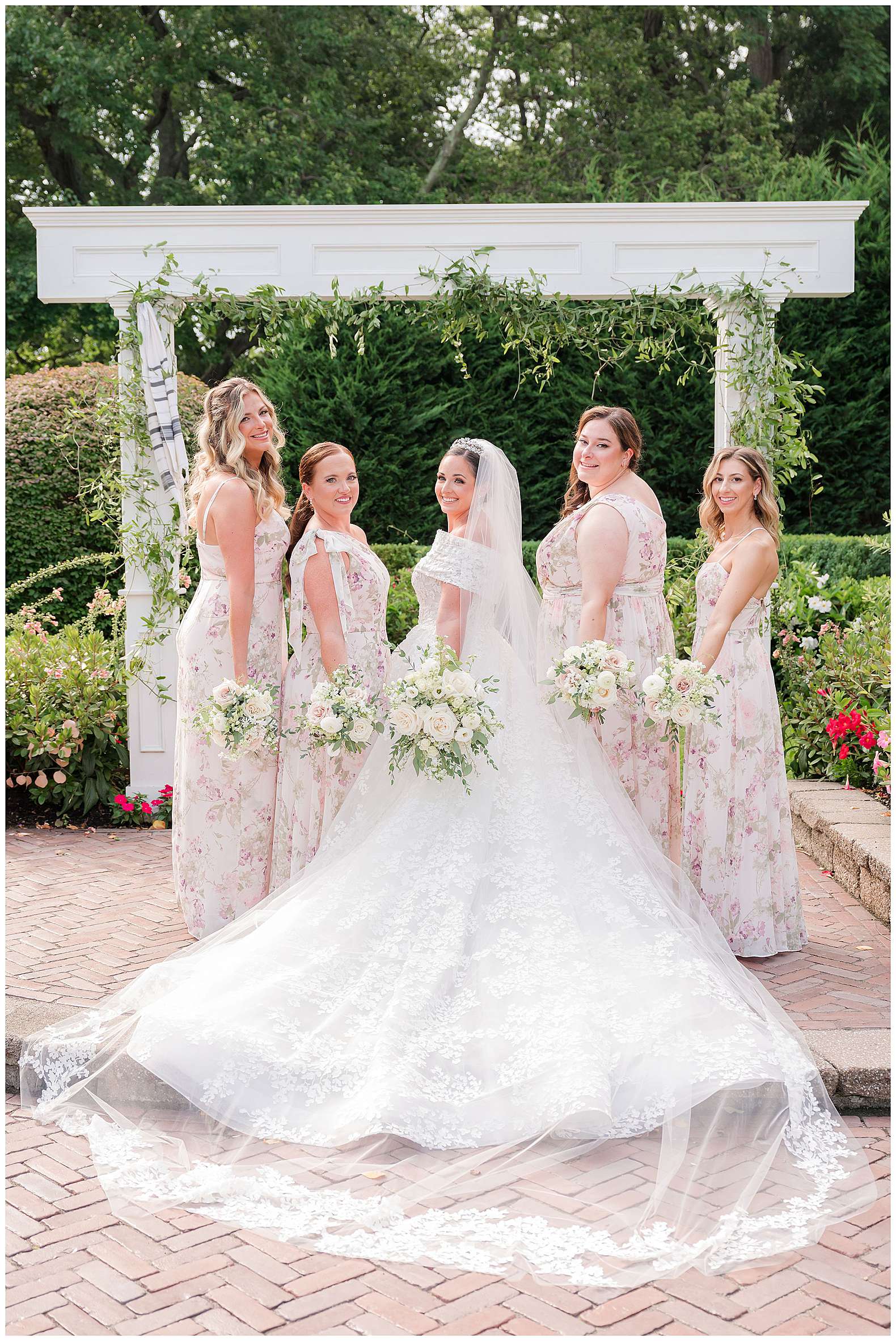 bride and bridesmaids outside at The Mill Lakeside Manor in Spring Lake, NJ