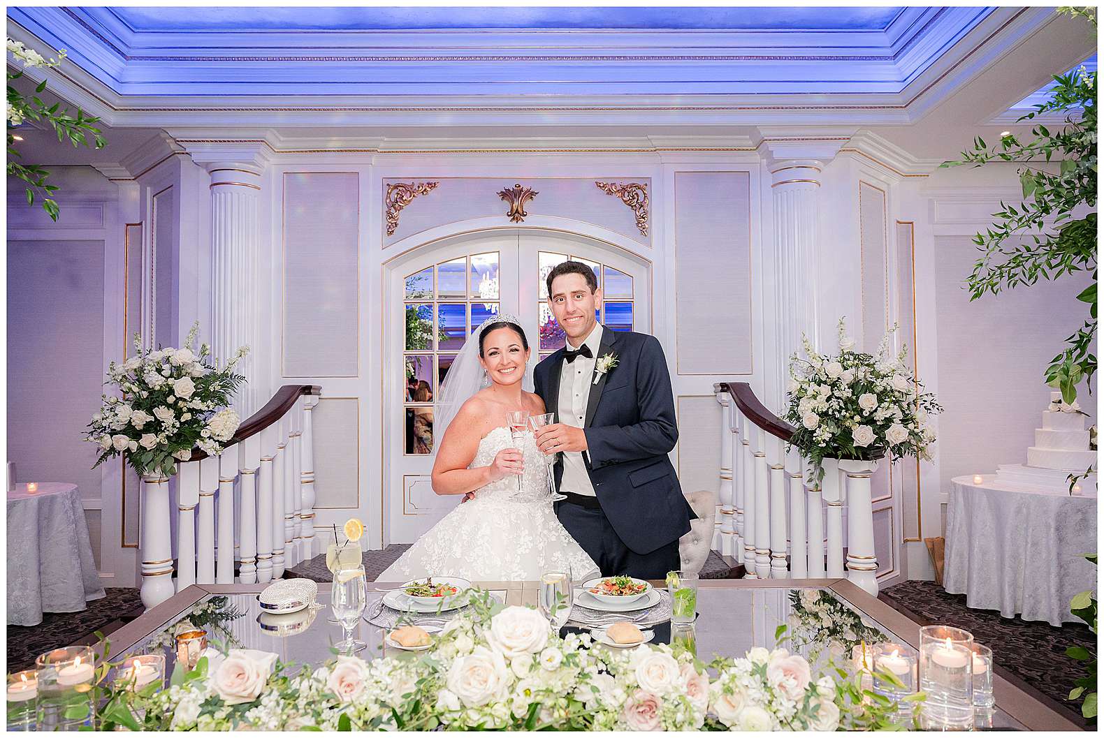 bride and groom at sweetheart table