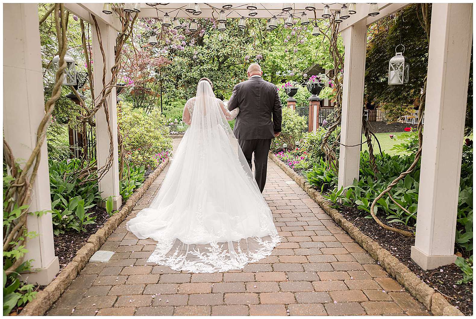 bride and her father entering wedding ceremony at Scotland Run wedding in Williamstown, NJ