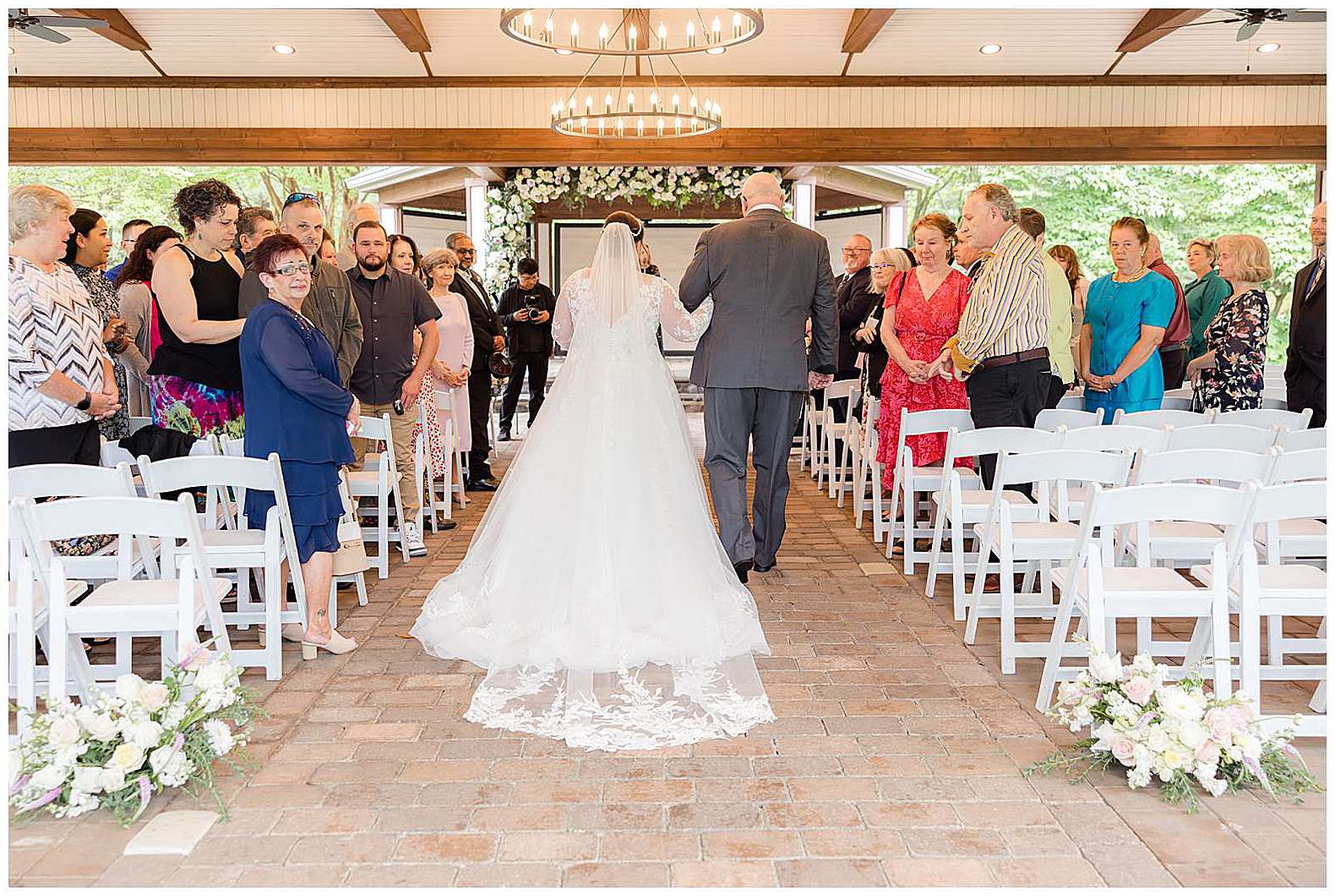 bride walking down tie aisle at Scotland Run wedding in Williamstown, NJ