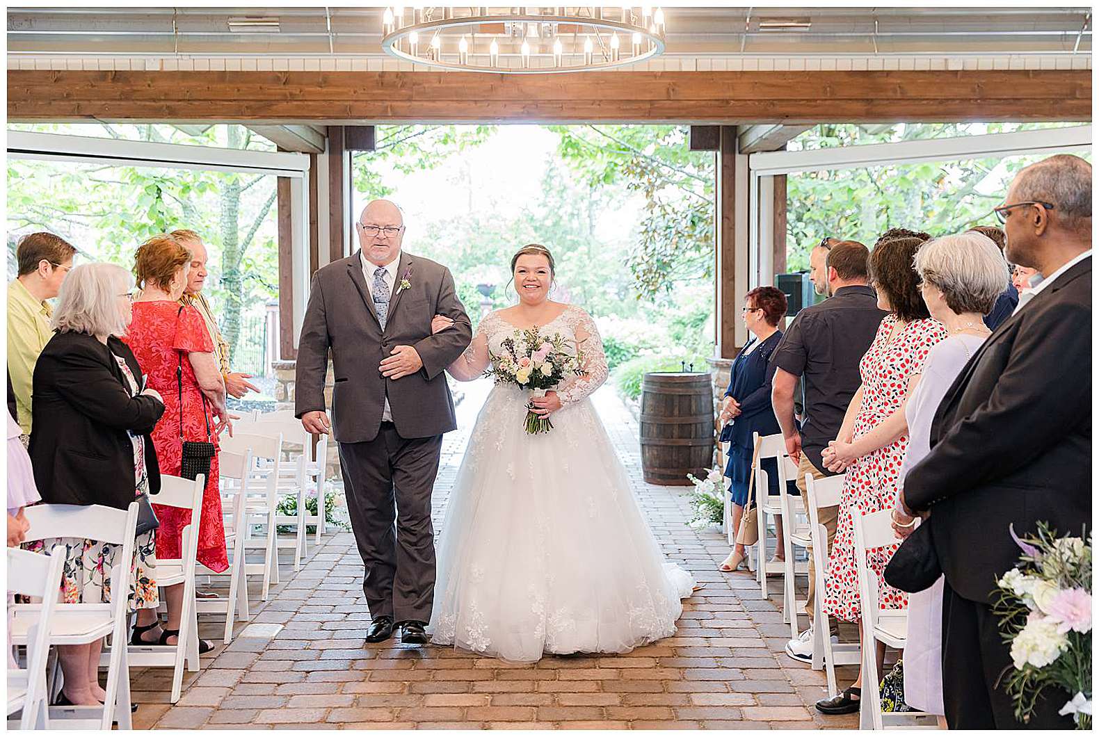 bride walking down tie aisle with dad at Scotland Run wedding in Williamstown, NJ