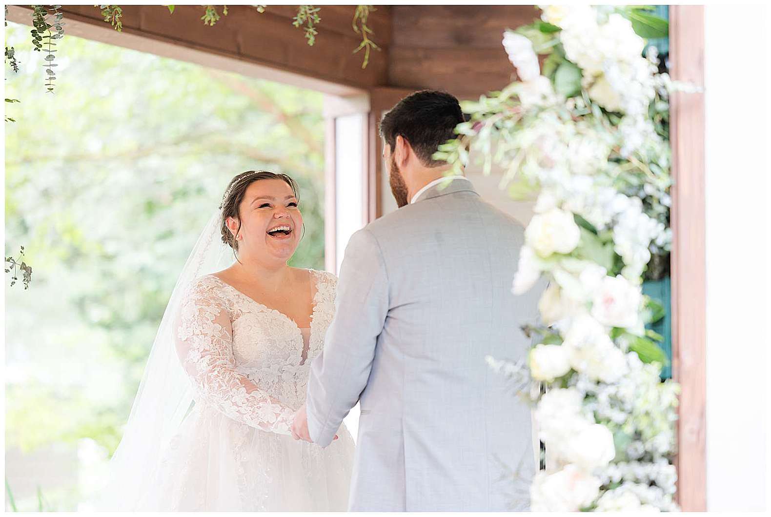 bride laughing during vow exchange at Scotland Run wedding in Williamstown, NJ