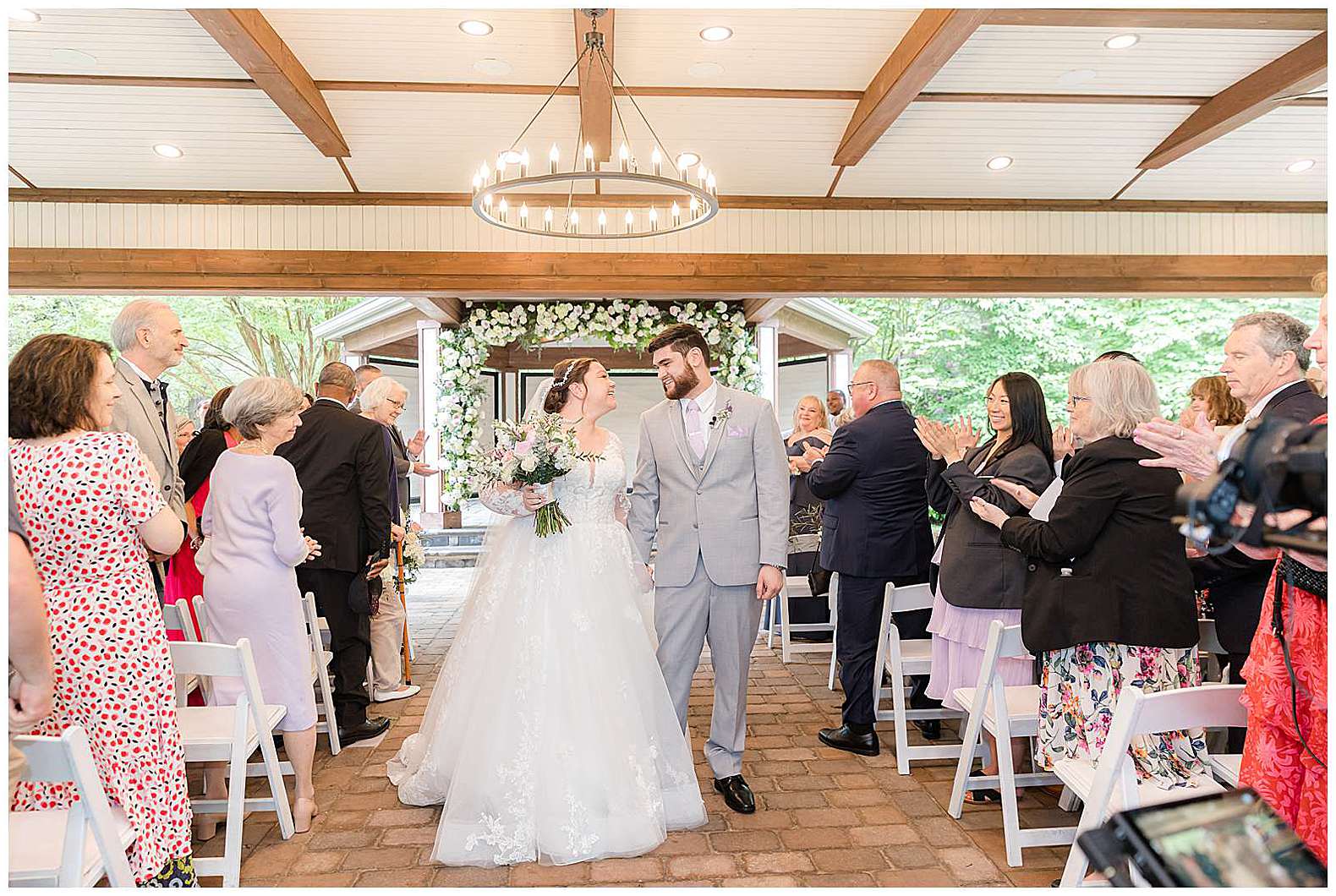 bride and groom walking down the aisle at Scotland Run wedding in Williamstown, NJ