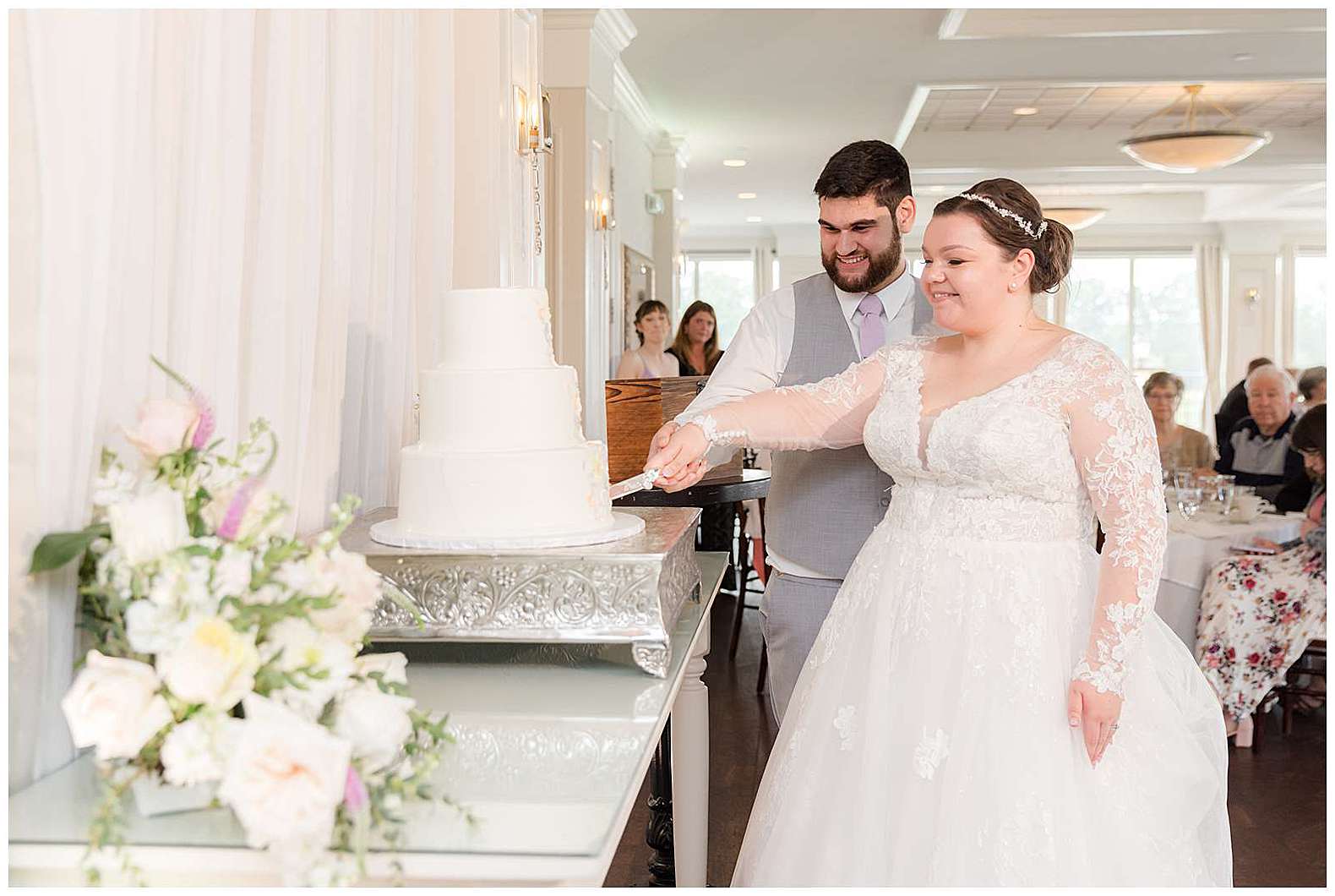 bride and groom cutting cake at Scotland Run wedding in Williamstown, NJ