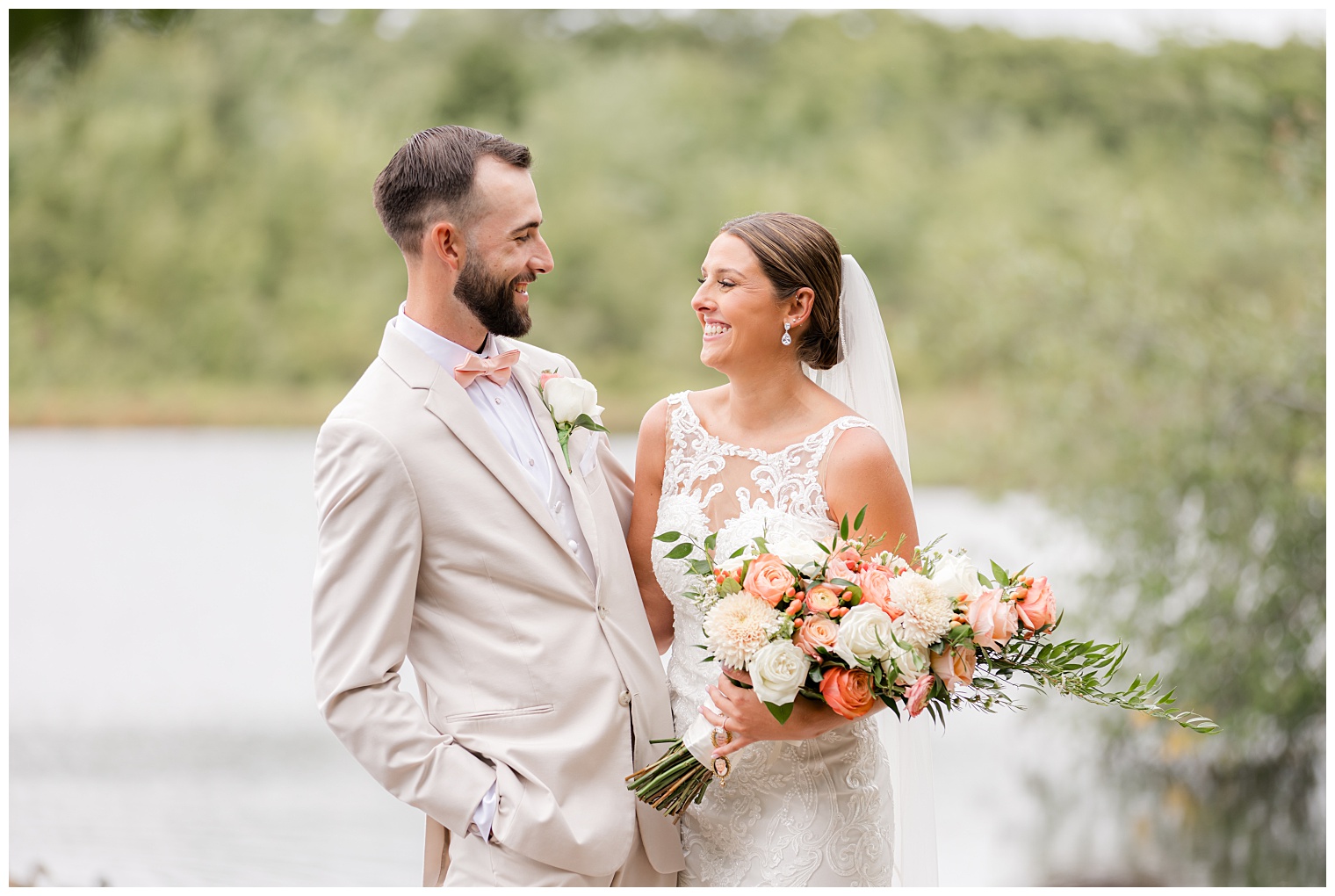 bride and groom smiling