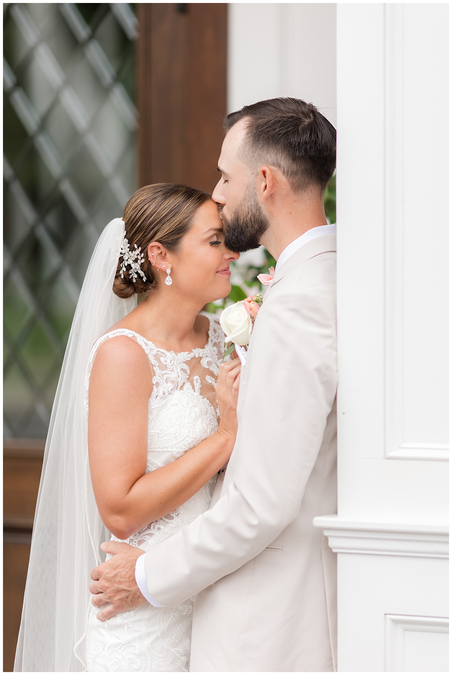 groom kissing the bride