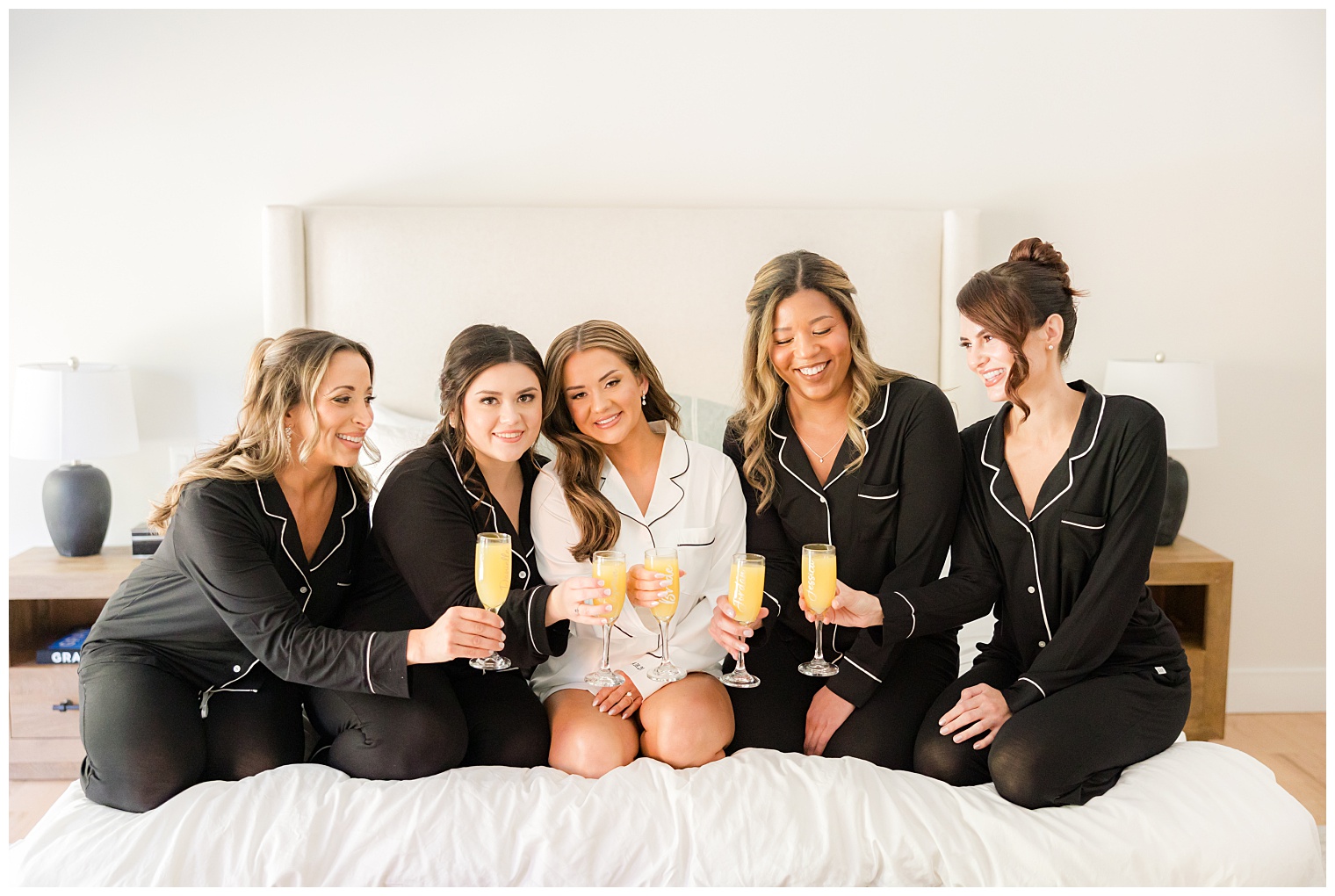 bride toasting with her bridesmaids