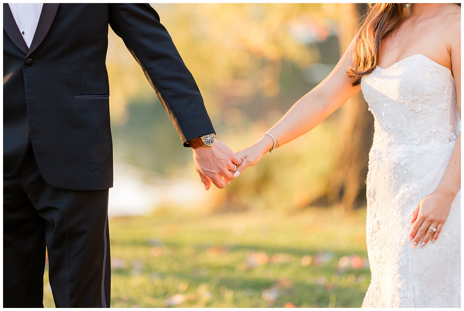 bride and groom holding hands
