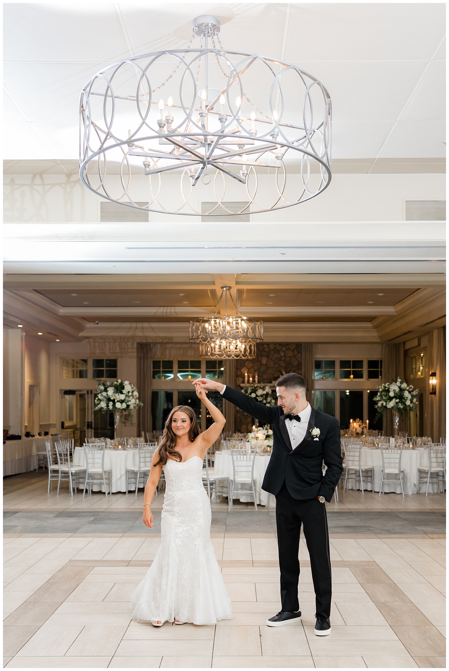 bride and groom dancing in the ballroom