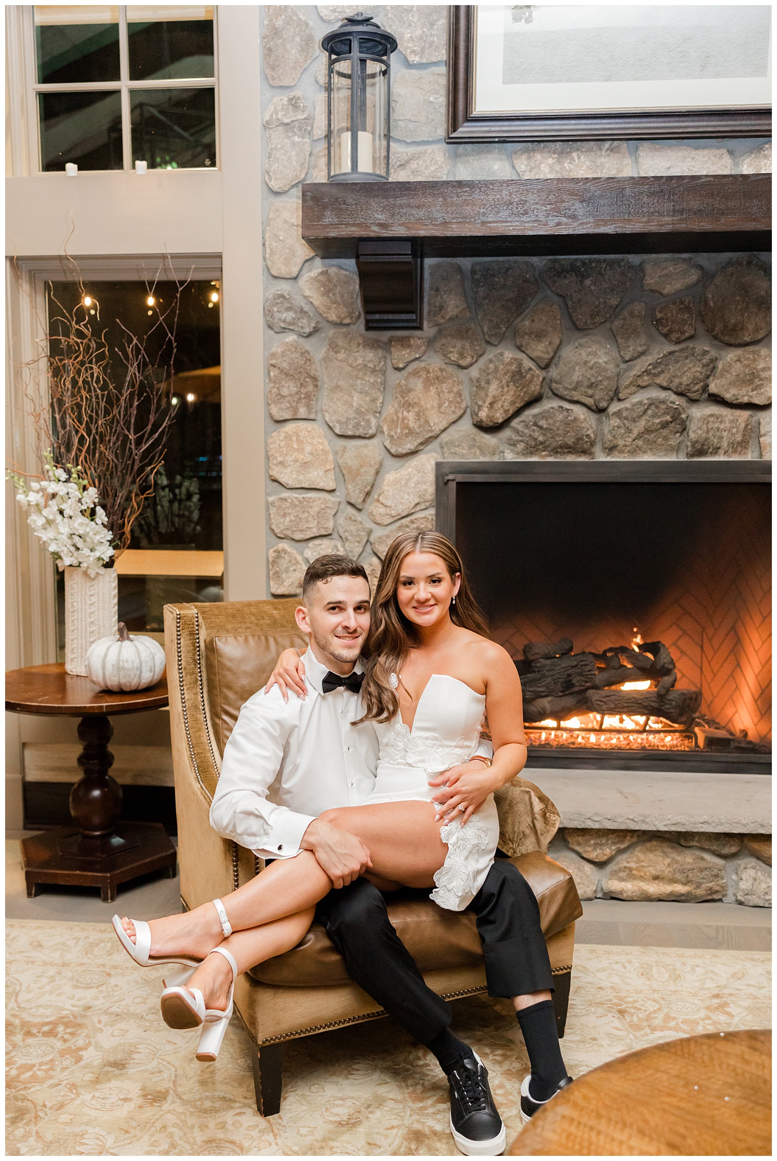 bride and groom near the fireplace