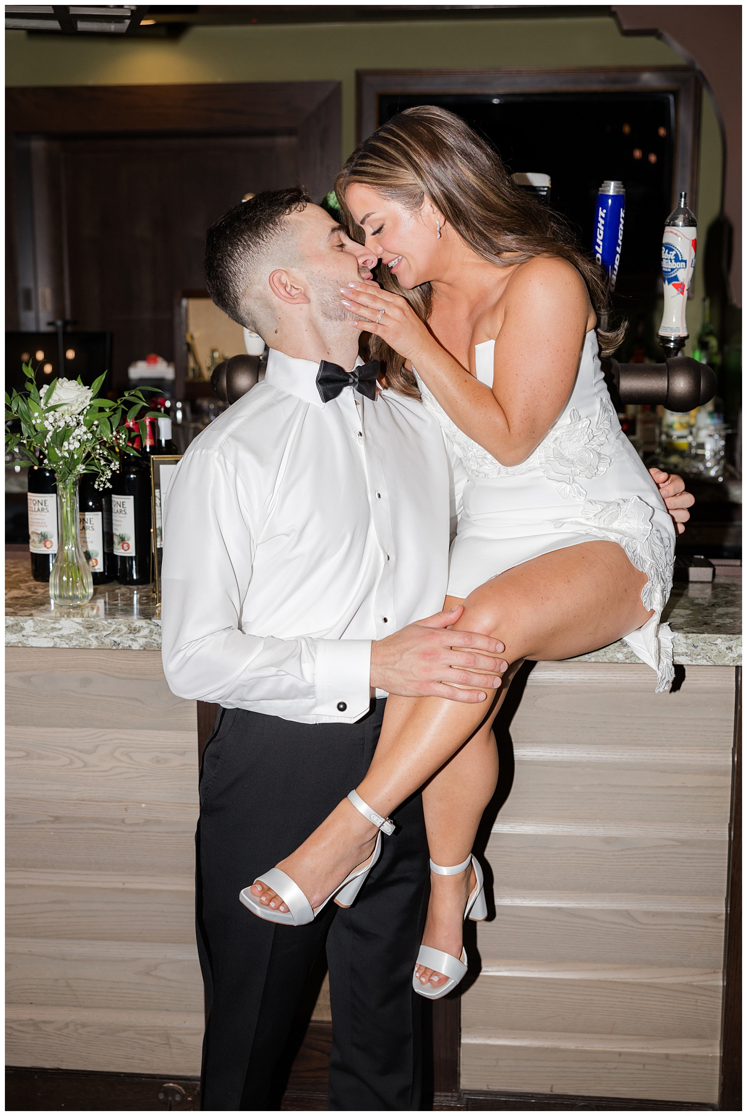 bride and groom kissing