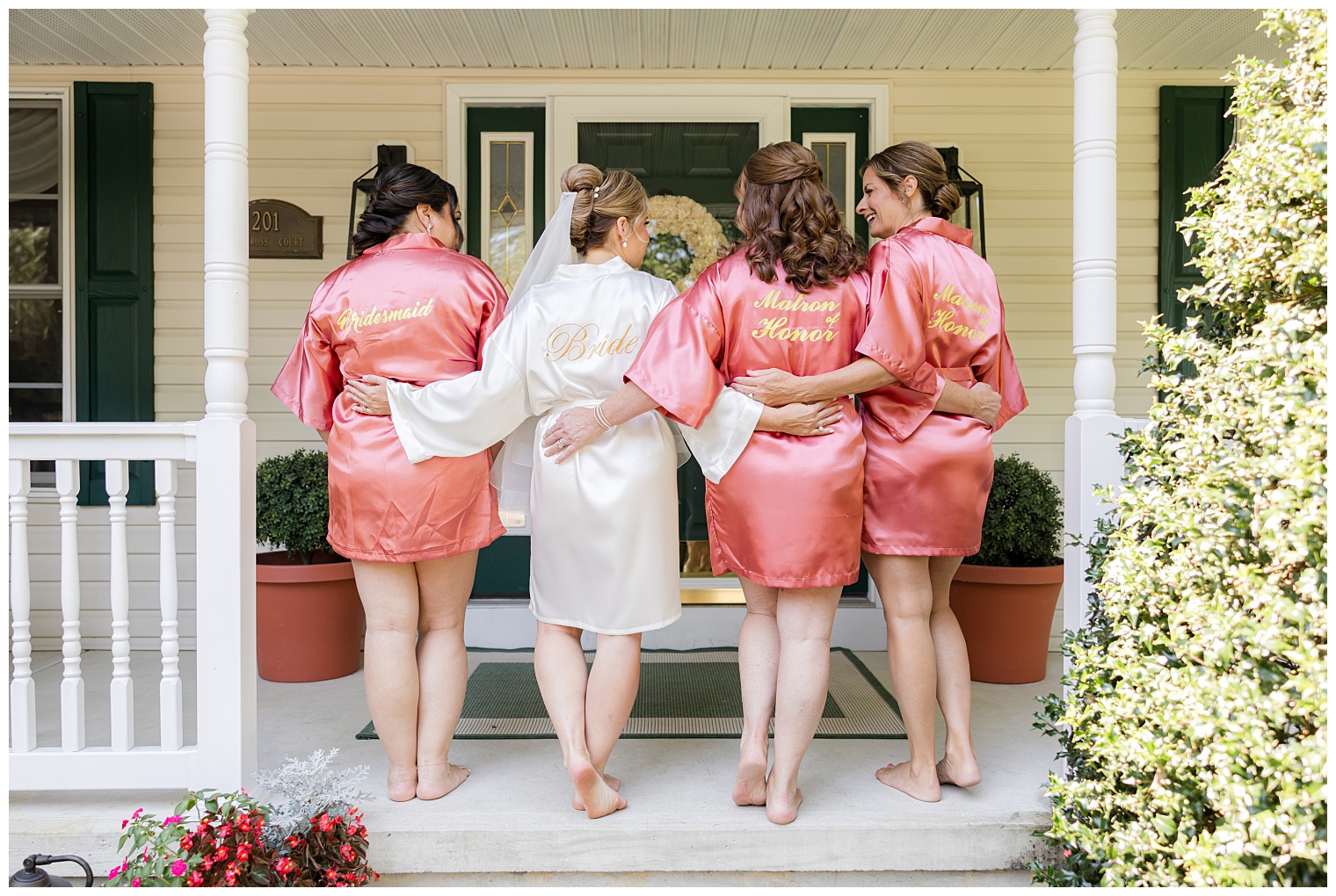 bride with her bridesmaids
