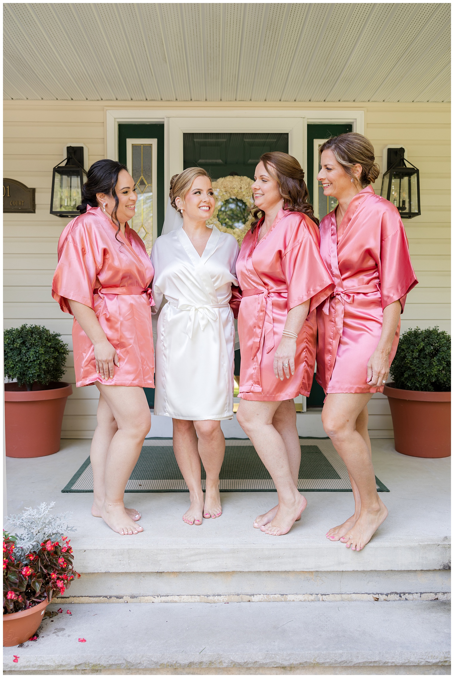 bride with her bridesmaids