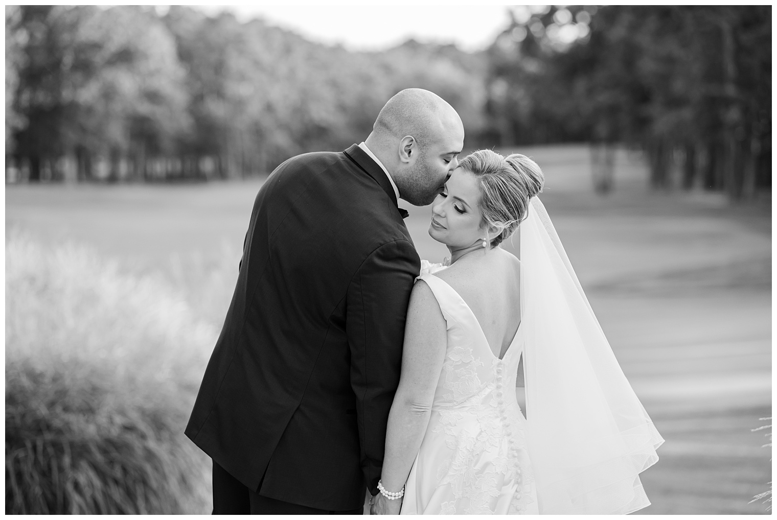 groom kissing the bride