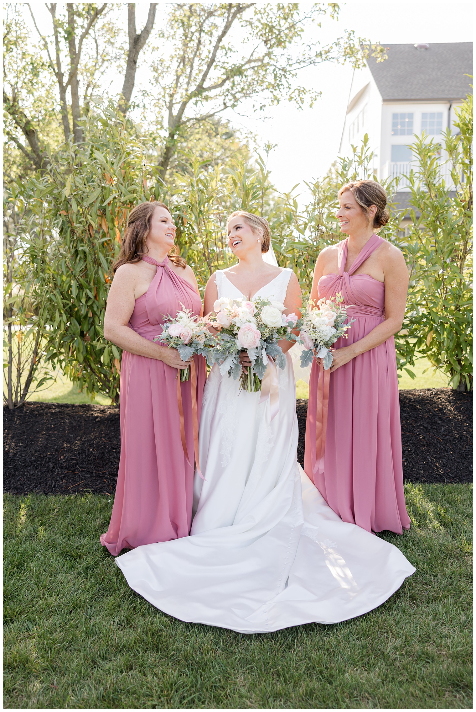 bride with her bridesmaids